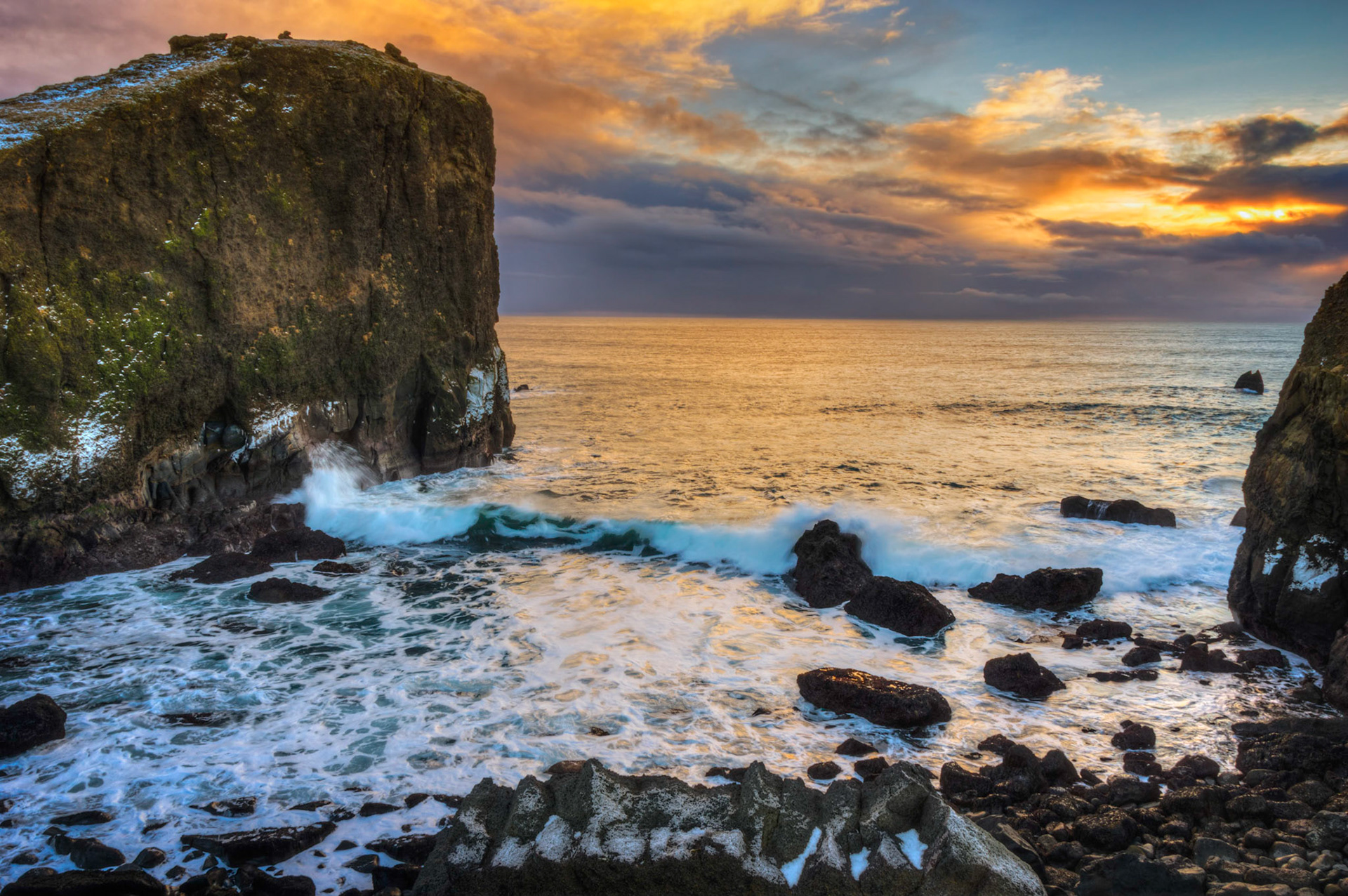 Late afternoon sunlight over the Atlantic Ocean on the far southwestern end of Iceland.Suðernes, IcelandFebruary 12, 2016This is an HDR image consisting of 5 exposures merged in Photomatix Pro. Additional processing in Lightroom and Photoshop.PENTAX K-3, Sigma 18-250mm f/3.5-6.3 DC OS HSMISO 100 18 mm  0.3 sec at ƒ / 18