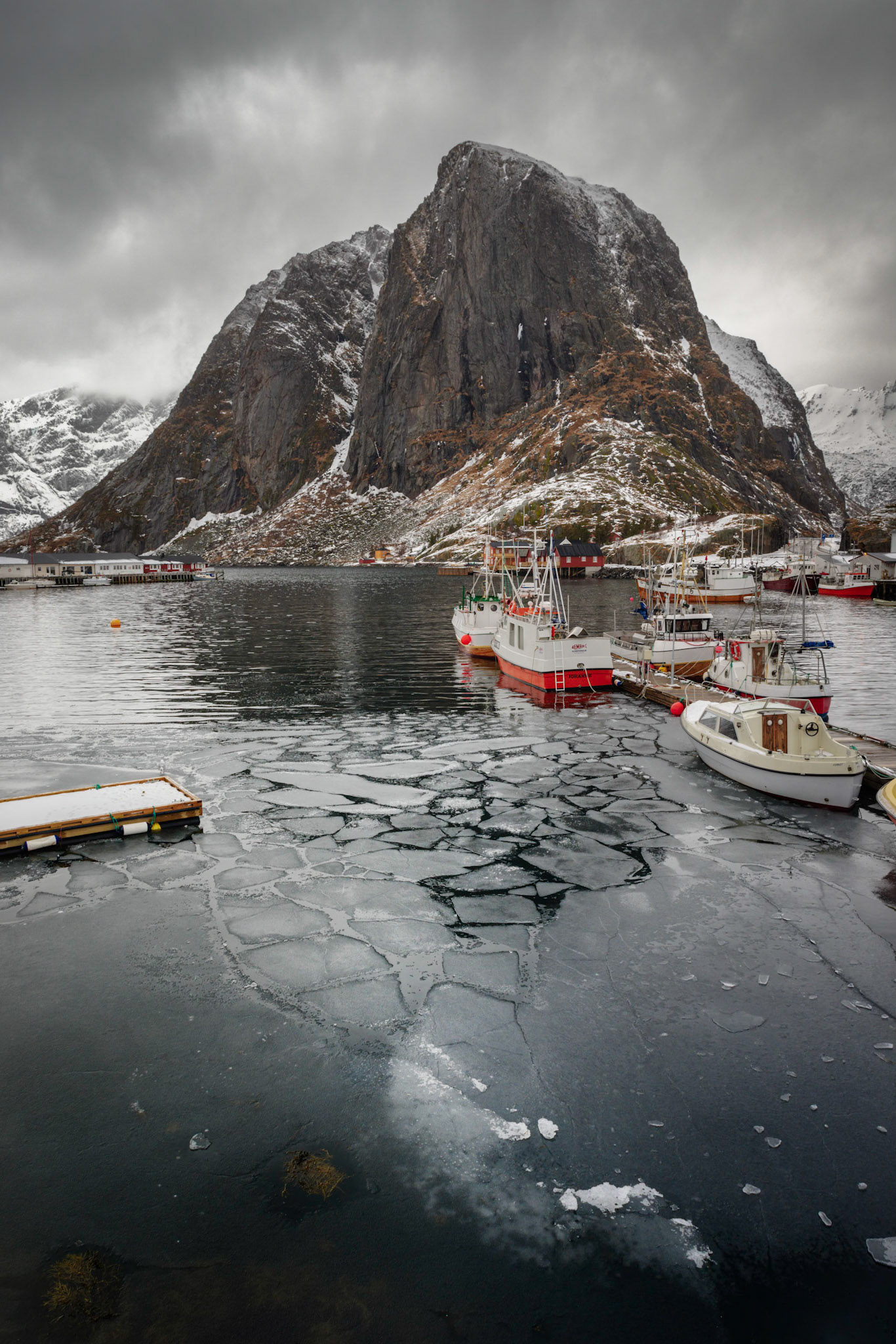 Some small chunks of sea ice linger in the harbour of Hamnøy in the middle of March.Hamnøy, Nordland, NorwayMarch 17, 2018PENTAX K-1, HD PENTAX-D FA 24-70mm F2.8ED SDM WRISO 400 24 mm  ¹⁄₁₅ sec at ƒ / 11