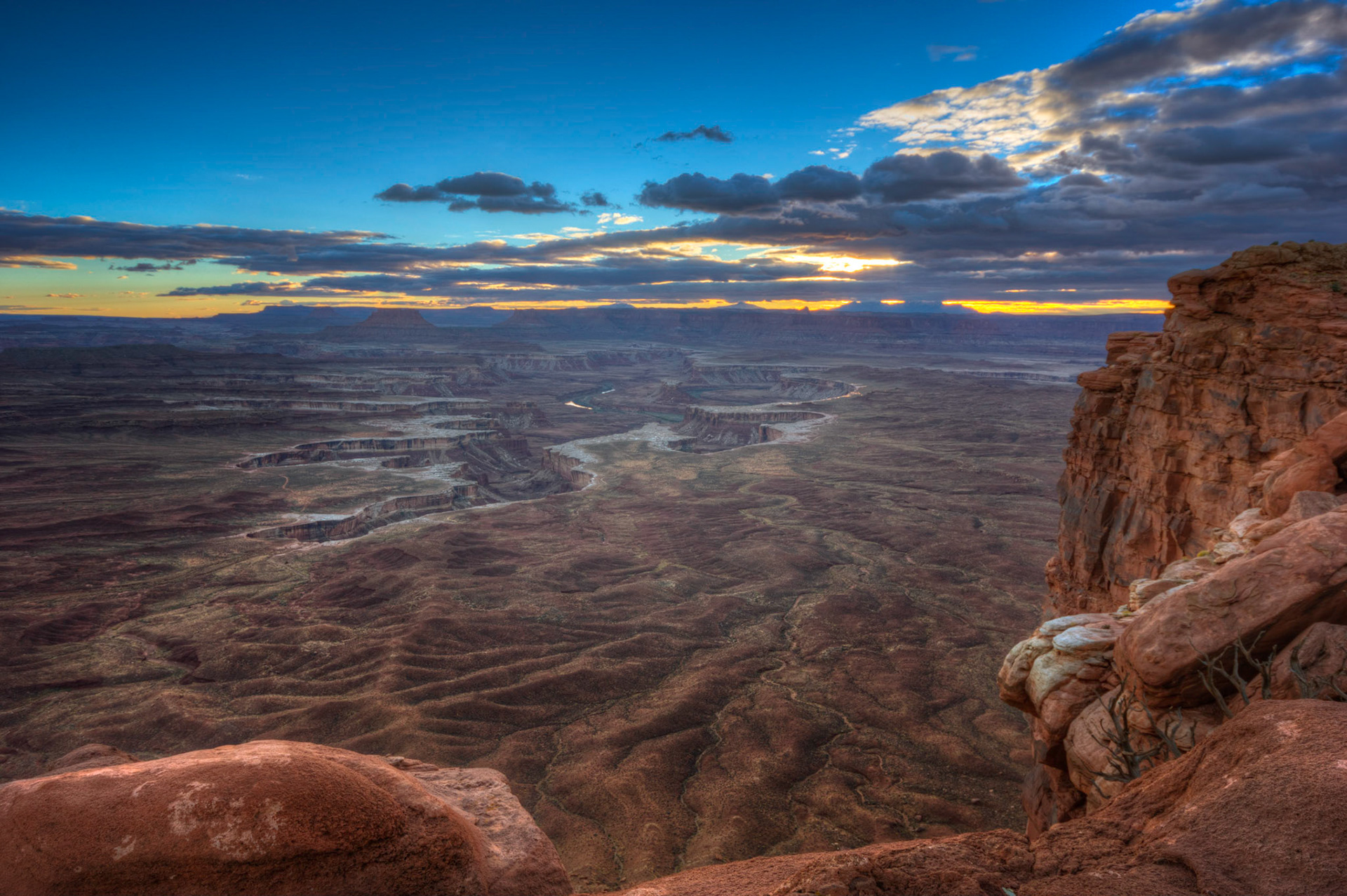 Near sunset at the Green River Overlook.Canyonlands National Park3 November 2014This is an HDR image consisting of 5 exposures merged in Photomatix Pro. Additional processing in Lightroom and Photoshop.PENTAX K-3, Sigma 10-20mm f/4-5.6 EX DCISO 100 17 mm  ¹⁄₂₀ sec at ƒ / 11Prints of my work are available from my website at http://www.fingolfinphoto.comFollow me on Facebook at http://www.facebook.com/fingolfinphoto or http://www.facebook.com/pesterleAlso, http://500px.com/pesterle   http://www.flickr.com/photos/fingolfinphoto