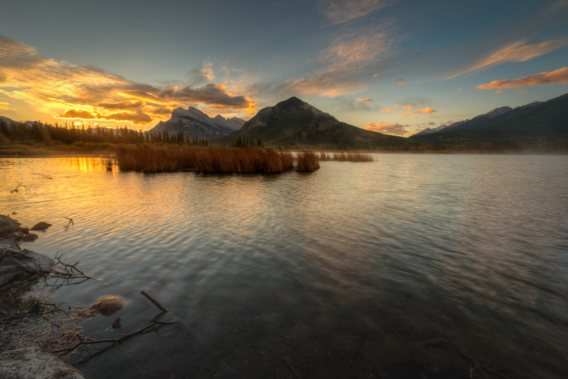 Sunrise over Mount Rundle, at one of the Vermillion Lakes.Improvement District No. 9, Alberta, CanadaSeptember 19, 2016This is an HDR image consisting of 5 exposures merged in Photomatix Pro. Additional processing in Lightroom and Photoshop.PENTAX K-1, HD PENTAX-D FA 15-30mm F2.8ED SDM WRISO 100 15 mm  ¹⁄₁₅ sec at ƒ / 18