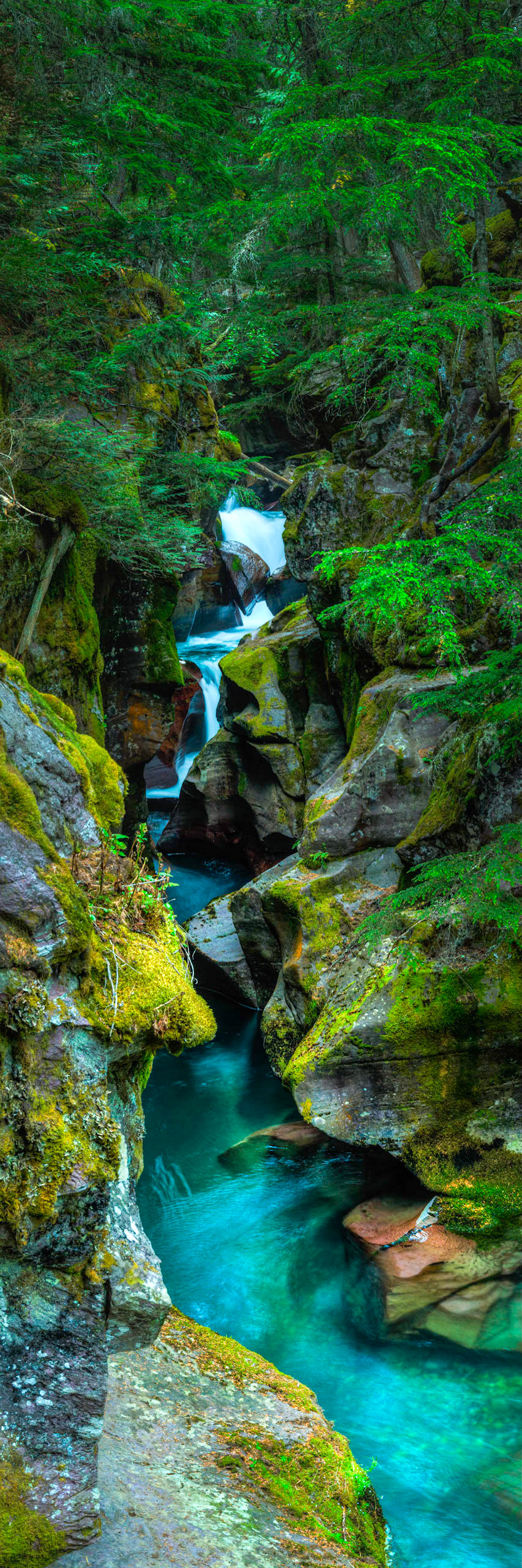 Avalanche Falls, at the base of the Avalanche gorge.  Glacier National ParkJuly 27, 2015This is an HDR panoramic image consisting of 10 frames comprised of 5 exposures each. HDR processing performed in Photomatix Pro.  Panoramic stitching performed in Photoshop. Additional processing performed in Lightroom and Photoshop.PENTAX K-3, Sigma 18-250mm f/3.5-6.3 DC OS HSMISO 100 63 mm  0.6 sec at ƒ / 11