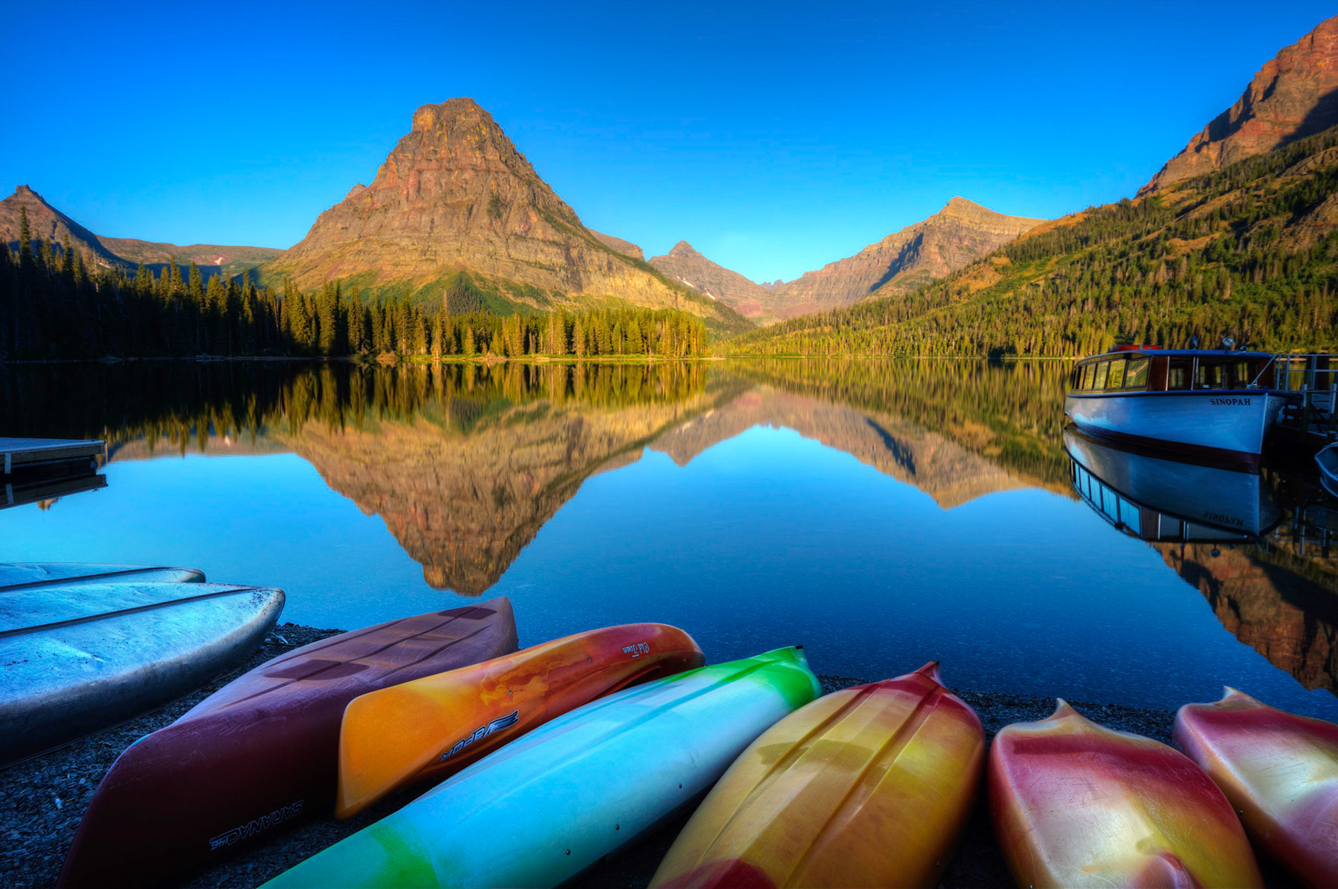After many days of strong winds, a still morning at Two Medicine Lake.Glacier National ParkJuly 30, 2015This is an HDR image consisting of 5 exposures merged in Photomatix Pro. Additional processing in Lightroom and Photoshop.PENTAX K-3, Sigma 10-20mm f/4-5.6 EX DCISO 100 18 mm  ¹⁄₂₀ sec at ƒ / 11