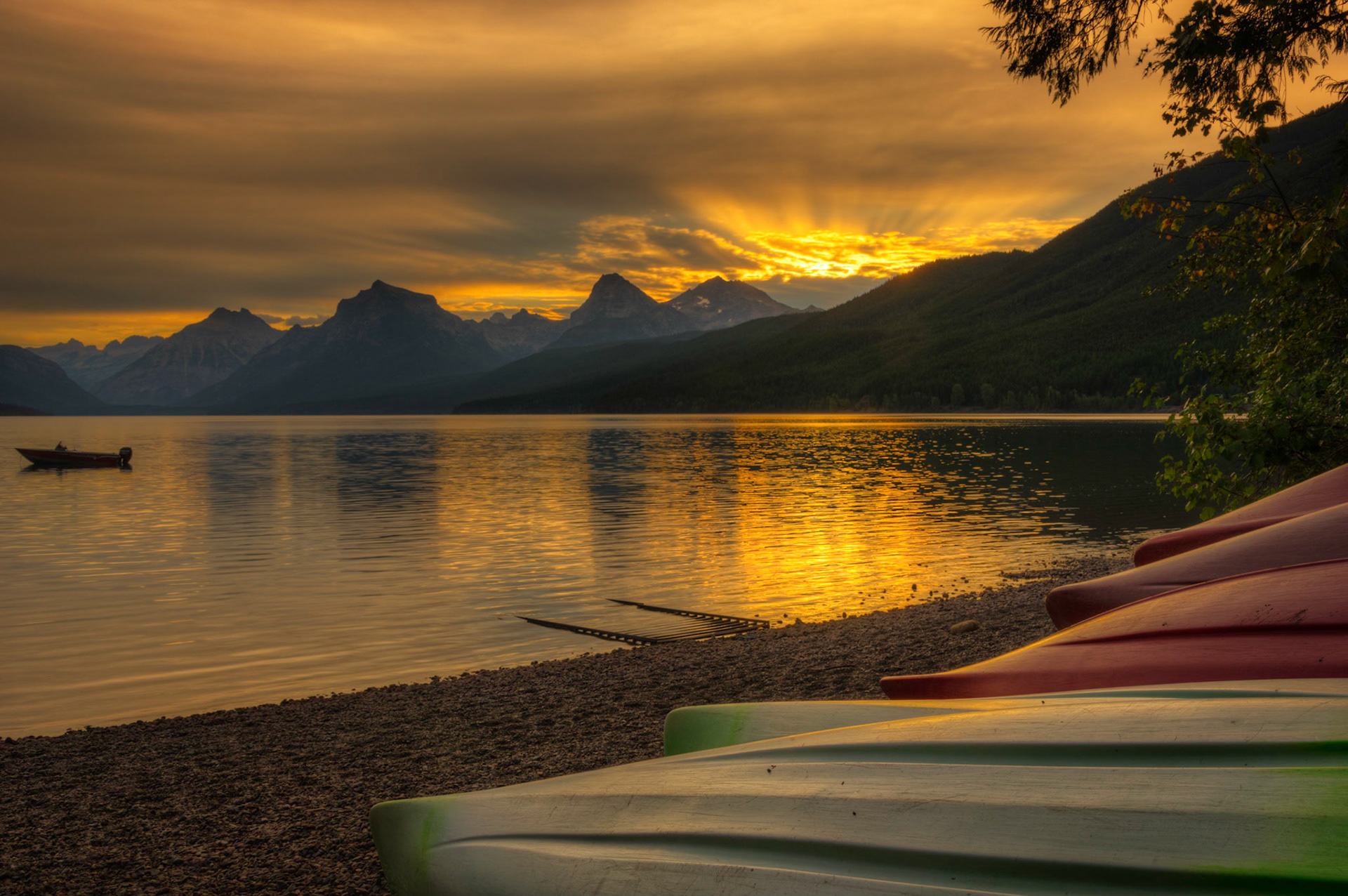 Sunrise along the shore of Lake McDonald, near Apgar Village.Glacier National ParkJuly 27, 2015This is an HDR image consisting of 5 exposures merged in Photomatix Pro. Additional processing in Lightroom and Photoshop.PENTAX K-3, Sigma 18-250mm f/3.5-6.3 DC OS HSMISO 100 24 mm  ¹⁄₂₅ sec at ƒ / 11