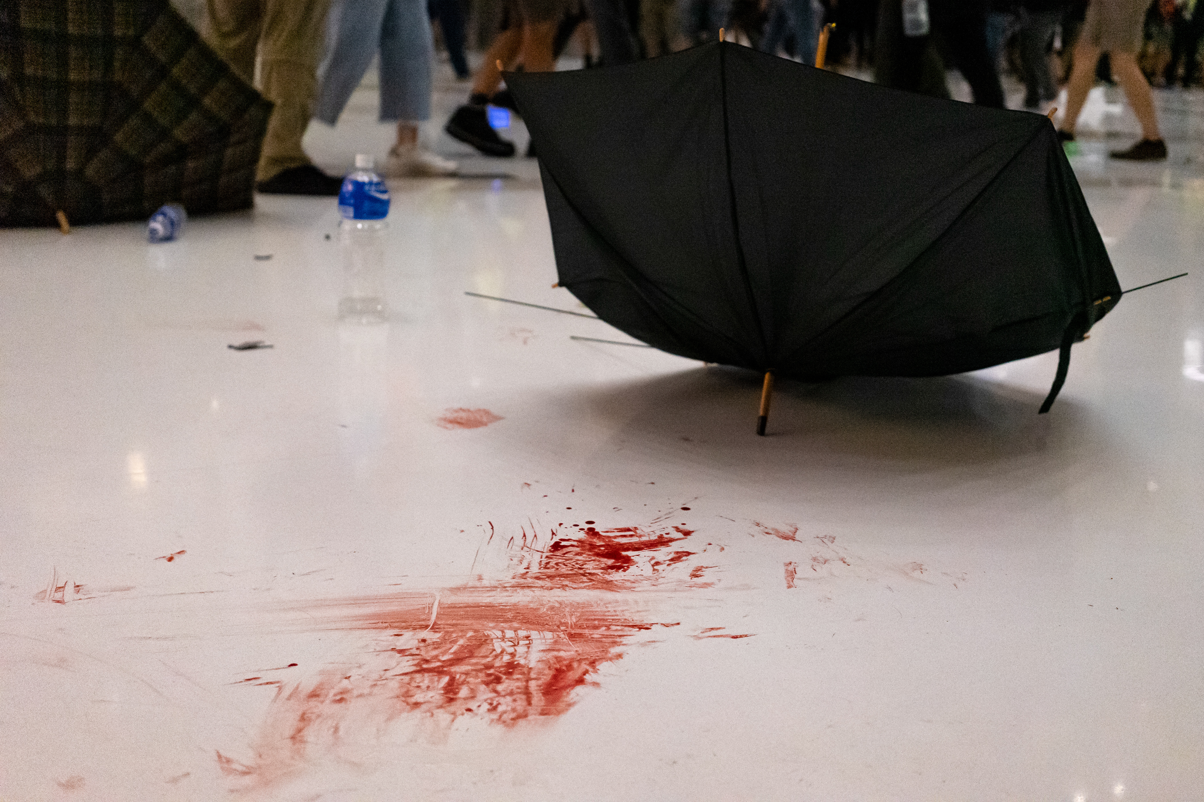 There were plenty of injuries to go around. As the conflict ebbed, medics, both on duty EMT's and volunteers flooded the mall to treat police and demonstrators. July 14, 2019-Hong Kong