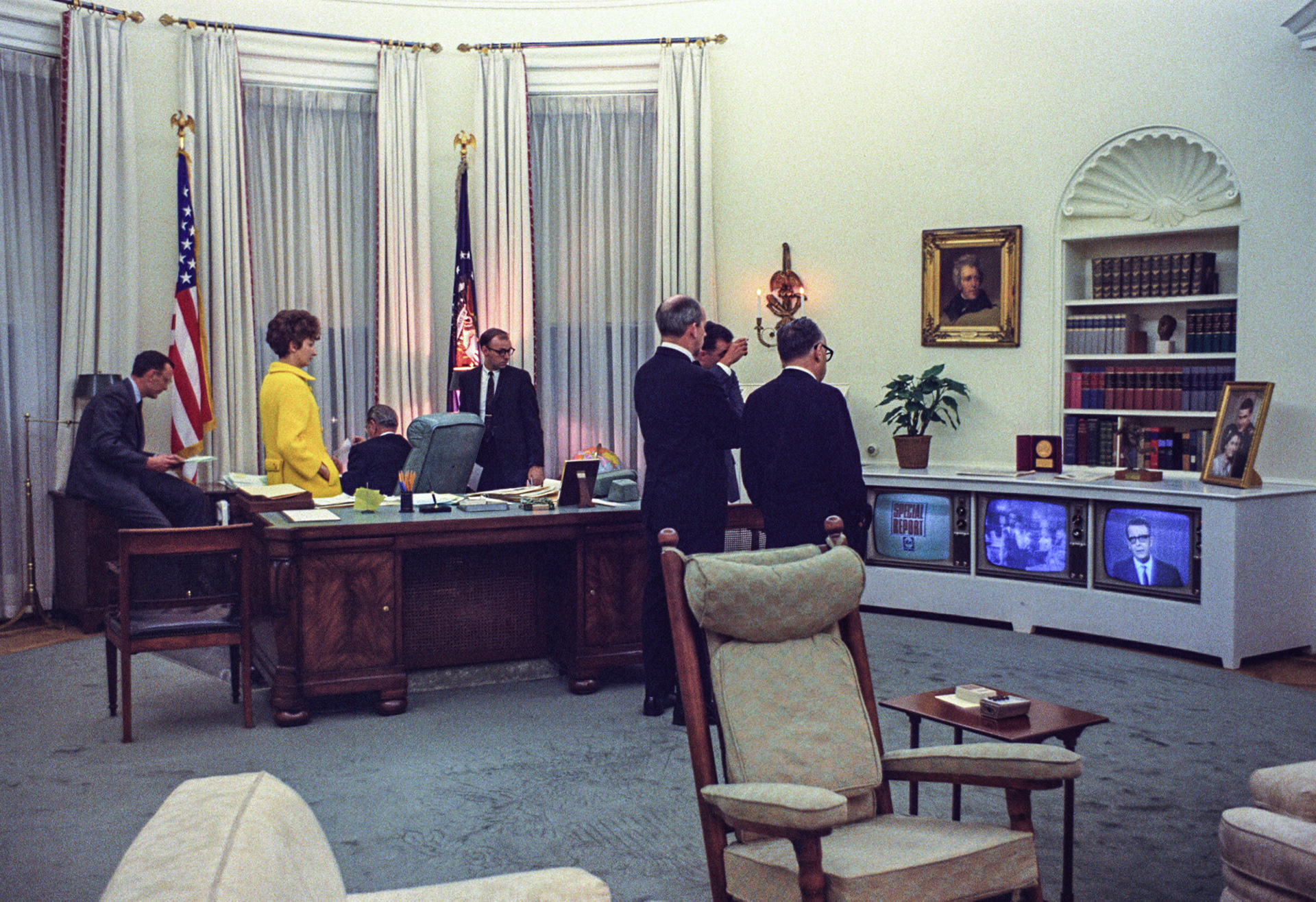 President Lyndon B. Johnson and members of his staff watch TV news reports concerning the assassination of Dr. Martin Luther King in the Oval Office, April 4, 1968.