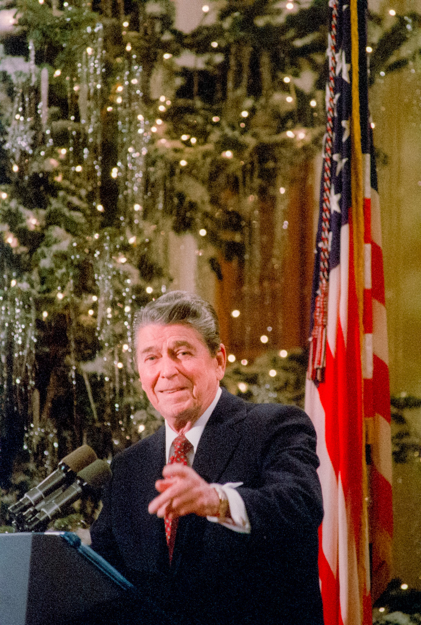 President Reagan holds his 6th press conference in the East Room of the White House decorated for Christmas, December 17, 1988.