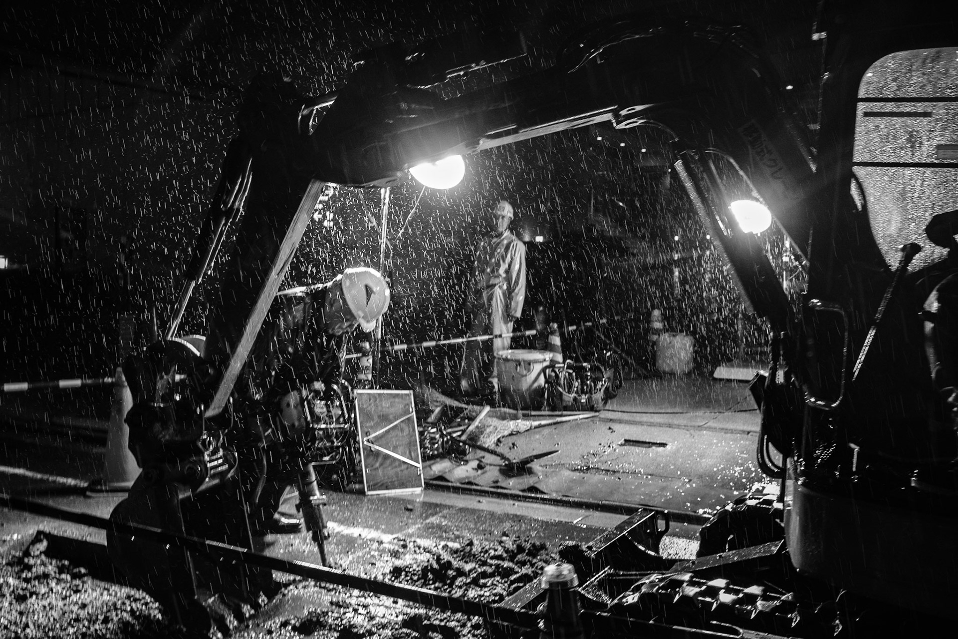 Rain or no rain, work must go on. The road will not fix itself!  
Japanese workers continuing work in spite of heavy rain. Meguro, Tokyo, #Japan.