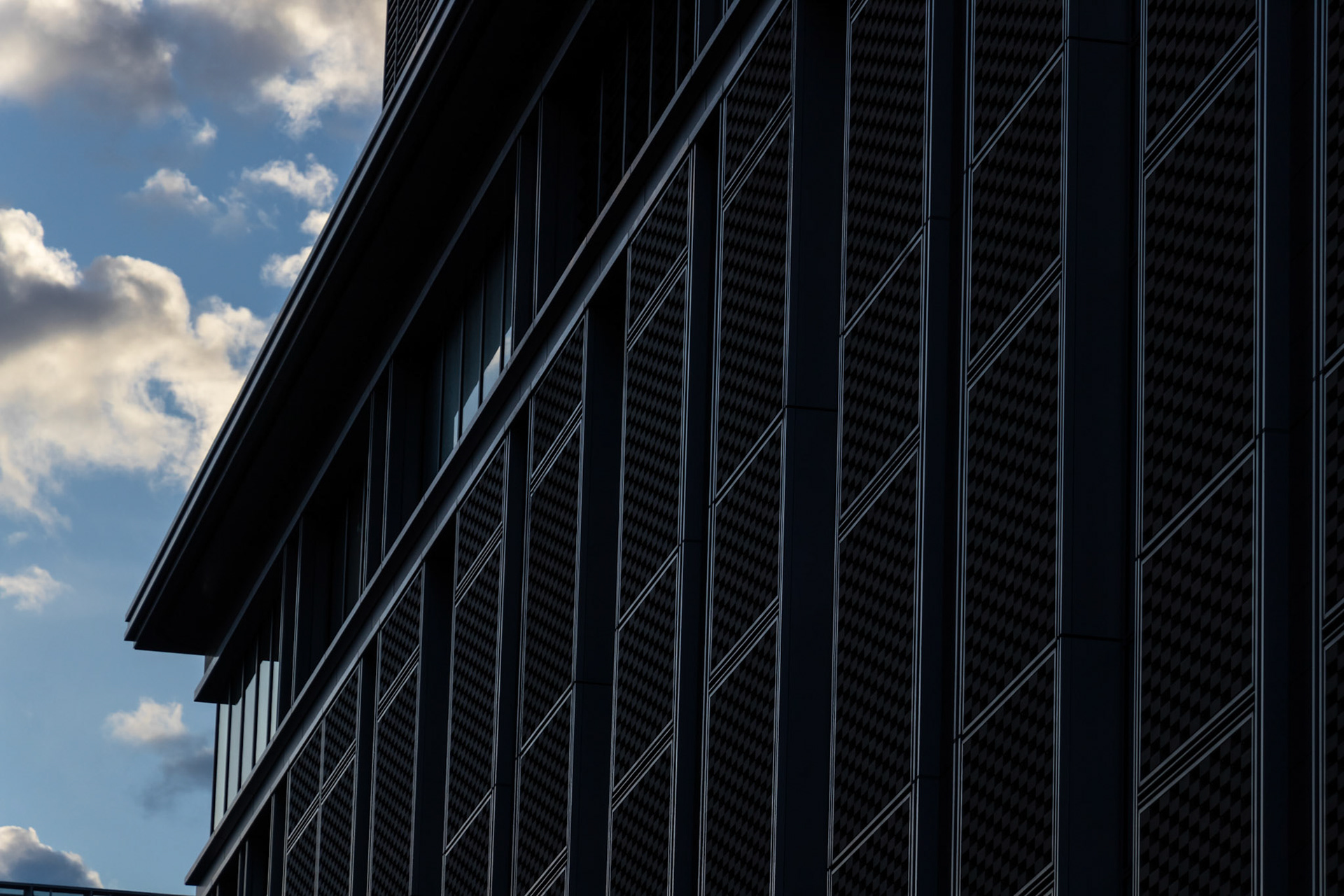 Windows and walls of high-rise buildings in Nihonbashi at dawn. This image was taken in October, Chuo Ward, Tokyo, Japan.