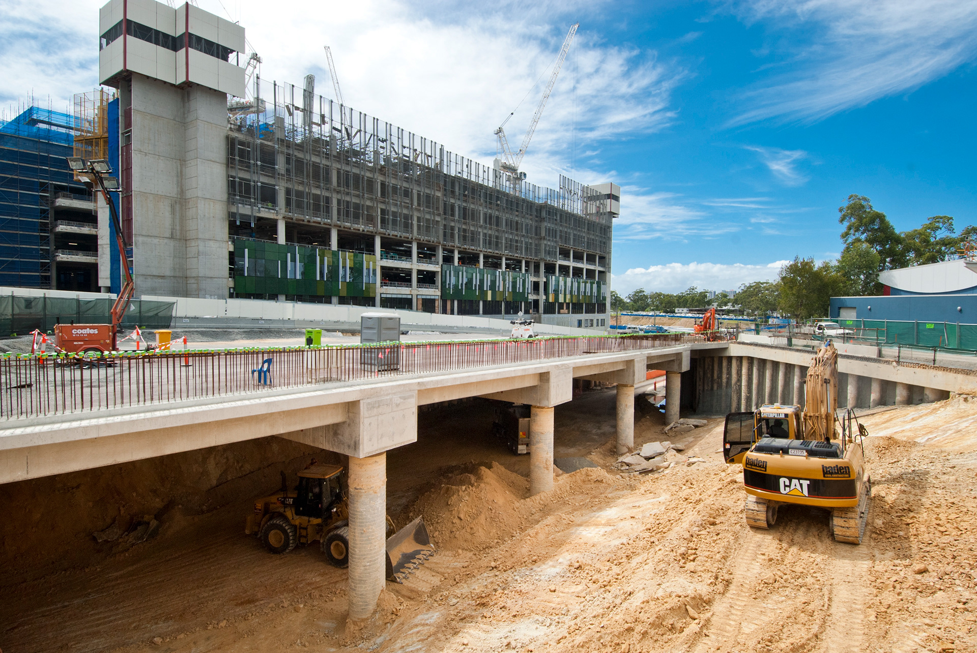 Excavator working on the construction of the station shell for the University which is in conjunction with the construction of the Gold Coast University Hospital.