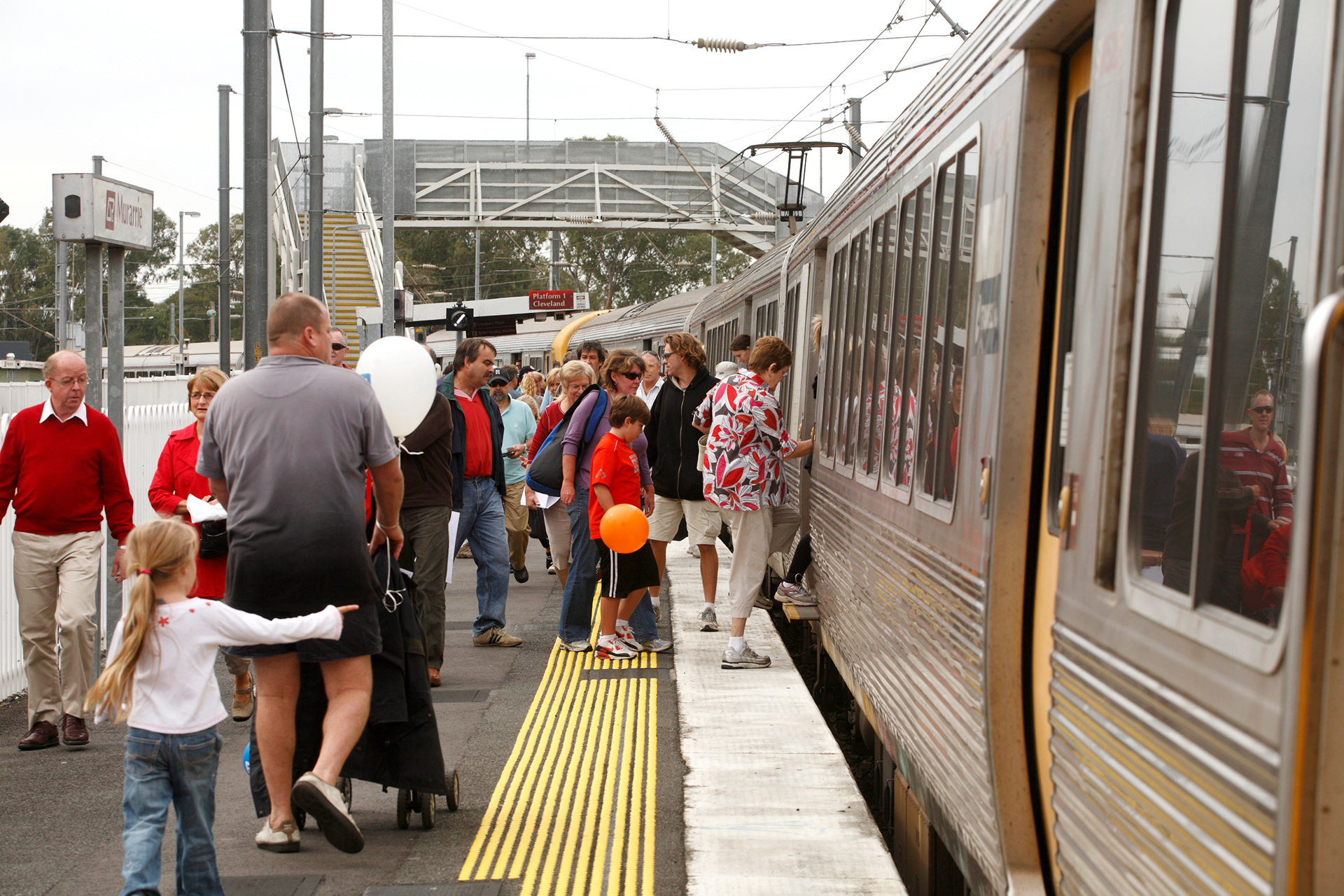 People boarding a train