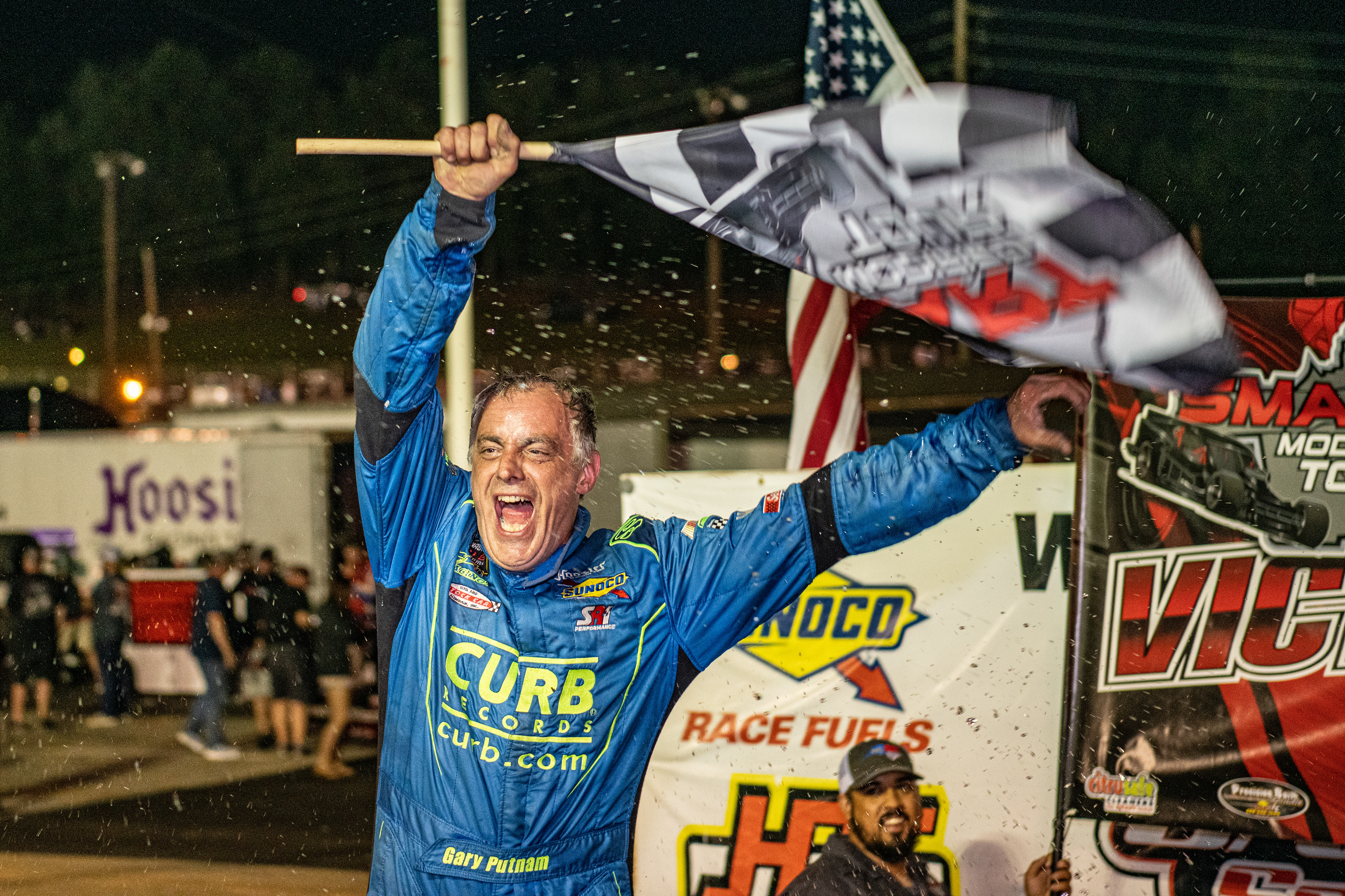 Gary Puttnam celebrates his victory in the SMART Modified 99 Lap race at Caraway Speedway during the Rusty Harpe Memorial in Sophia, N.C. on July 3, 2021.