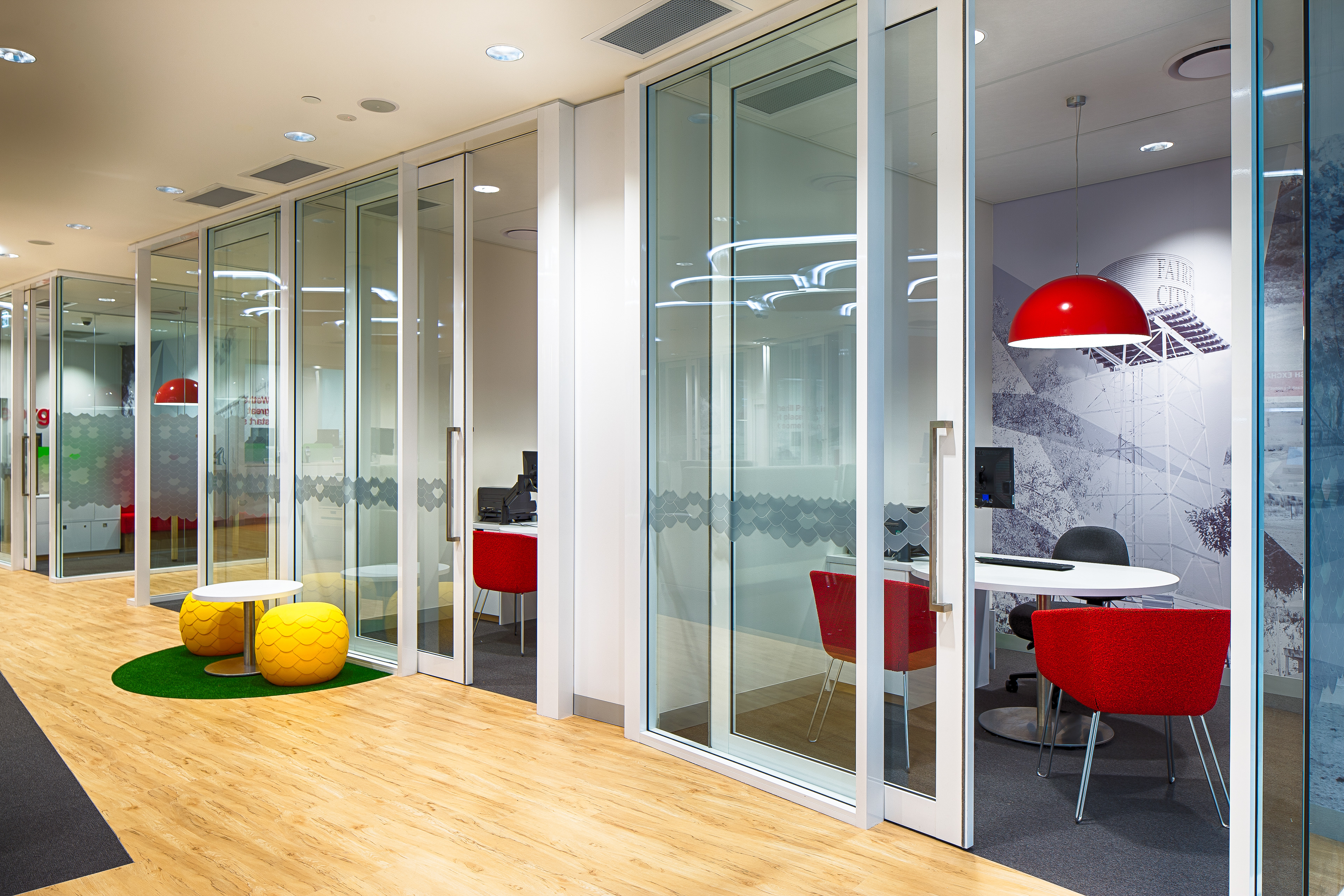 Acoustically private glass front meeting spaces