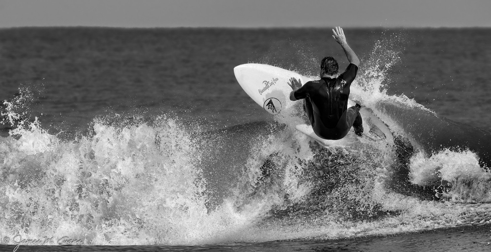 Touch the sky - Surfer off Assateague Island National Seashore in VA