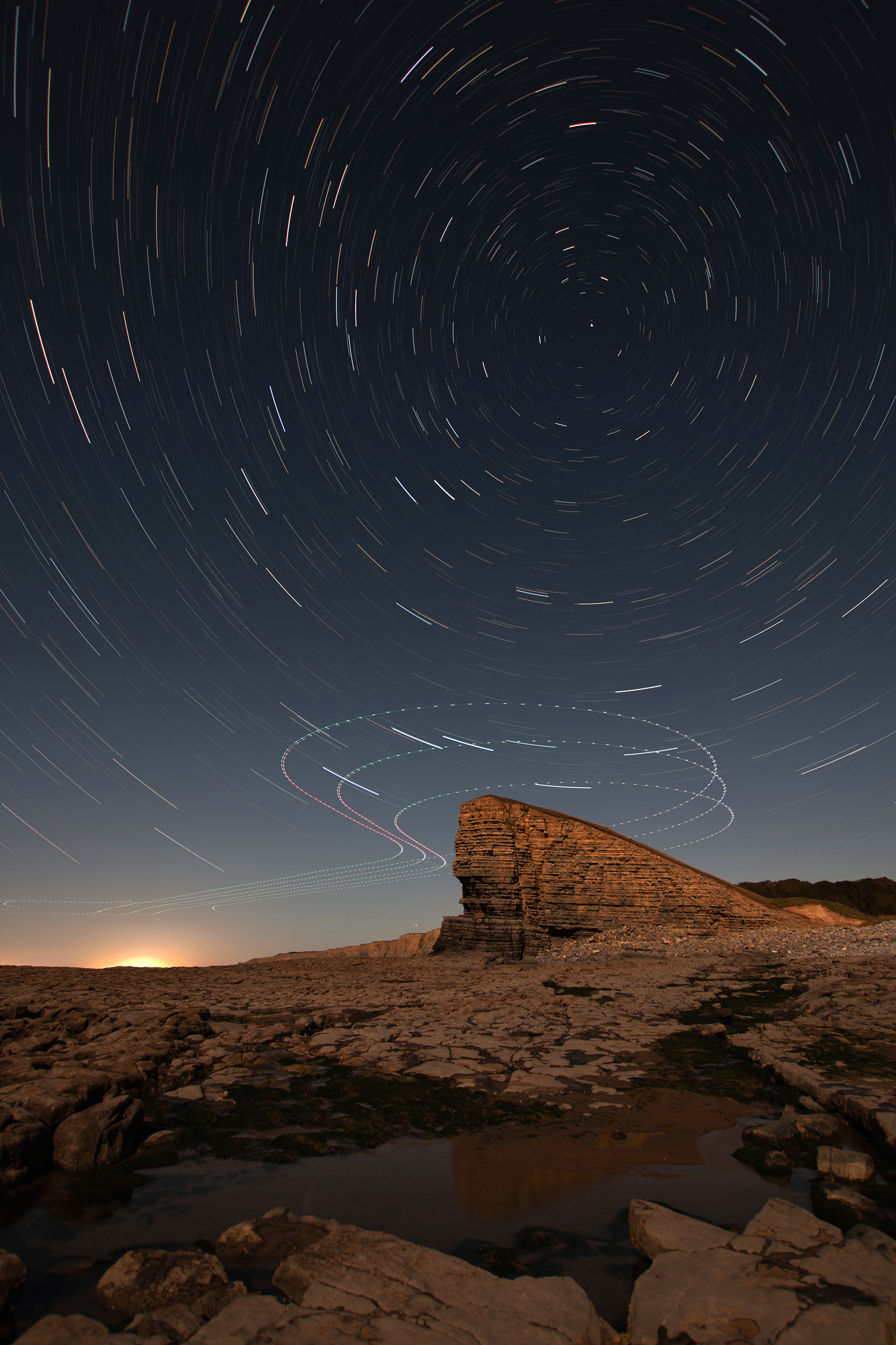 Night Cliffs Star and Plane Trails