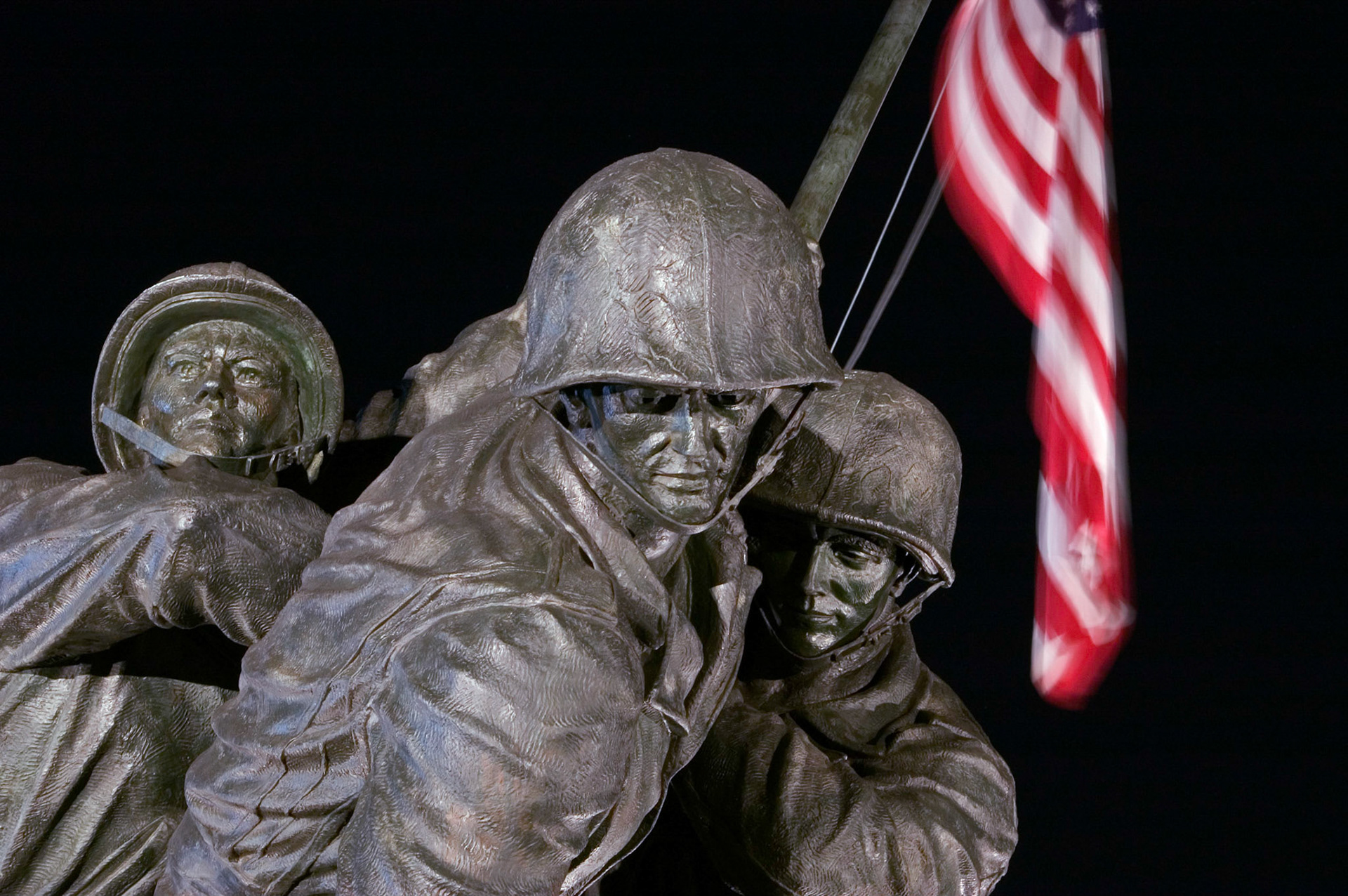 A view of the Iwo Jima Memorial in Arlington Virginia at night. It's officially called the United States Marine Corps War Memorial.
