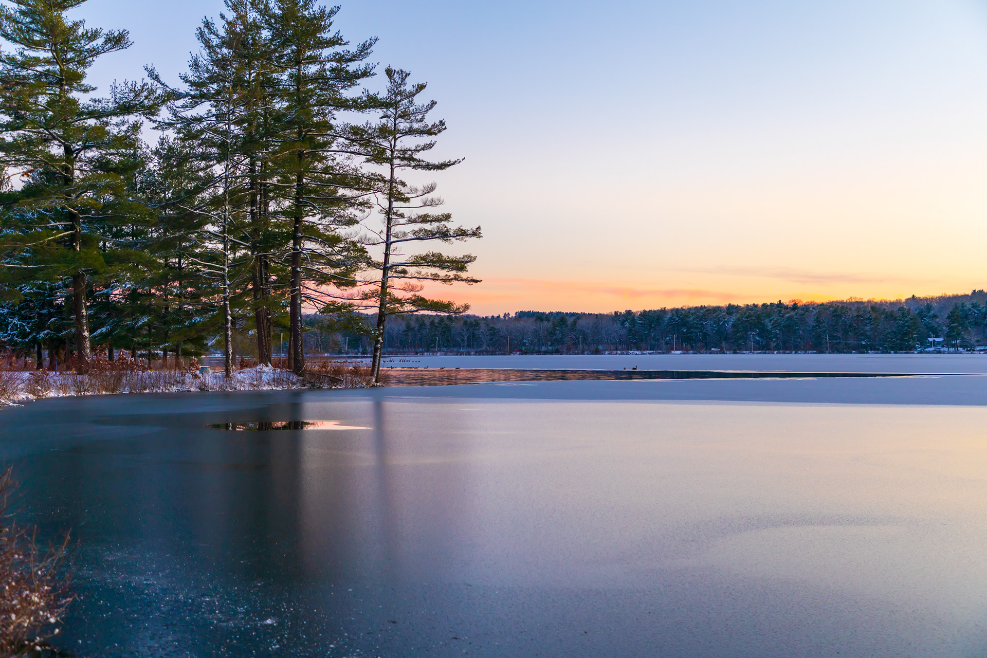 Reflections in the ice at sunset