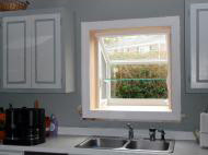 Garden window with glass shelf.