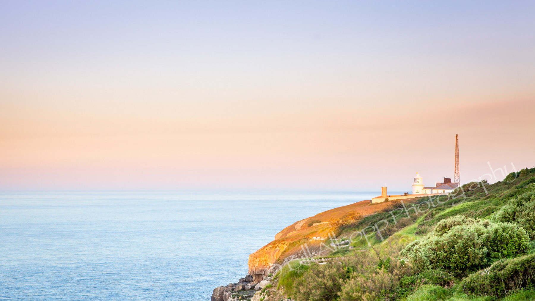 Anvil Point Lighthouse, Durlston Head, Dorset at sunrise.