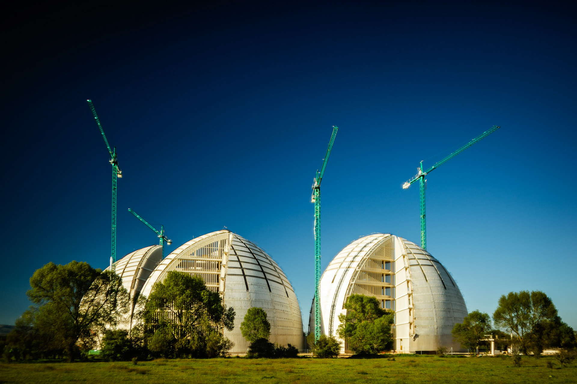 The City of the Environment. Garray, Soria, Castilla y León. In order to prevent the project from being appealed by environmentalists, the regional government passed a special law to approve the construction of The City of the Environment. With sustainability as its leitmotif, the project comprised a technology park for 100 companies in the environmental sector, an industrial park focused on environmentally friendly activities, a convention center for 30,000 visitors/year, a hotel, a sports center, an archaeological site, a public river park, and 780 sustainable houses. In the parking lot, each of the 709 parking spaces would be equipped with charging points for electric vehicles (while in 2012, in the whole of Spain, only 484 electric cars were sold). When the works were stopped in 2013 due to financing problems, 52 million euros of public money had already been spent here. Its future has been compromised even more after the Spanish Constitutional Court ruled unconstitutional the law by which it was approved. In 2014, a court ruling stated that the complex was to be demolished, and the landscape restituted. Because the irony of it all is that the complex was built on virgin land that was “especially protected”.