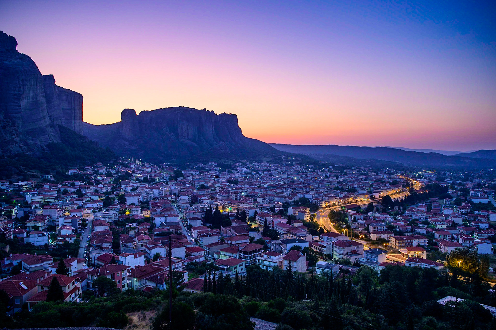 Sunrise on Kalambaka City Under Meteora Rocks Greece