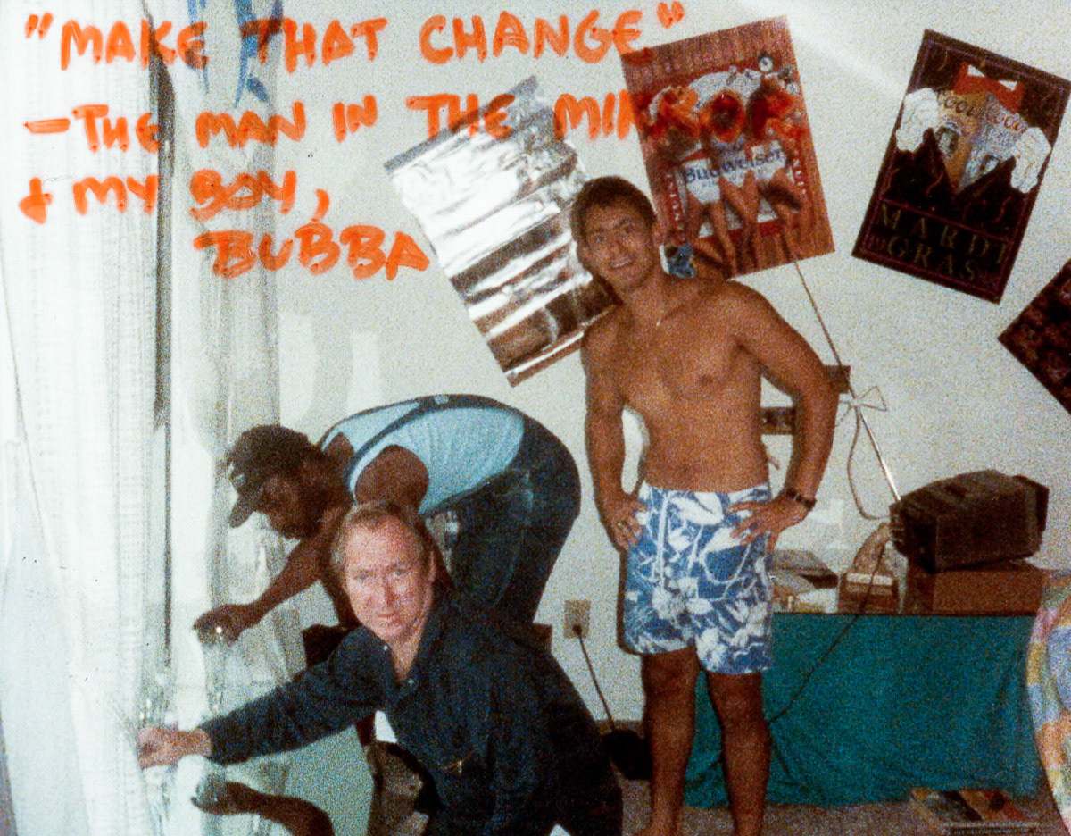 Kenny had some custom glass work done for his bedroom. The guy looking into the camera introduced his assistant as his boy.