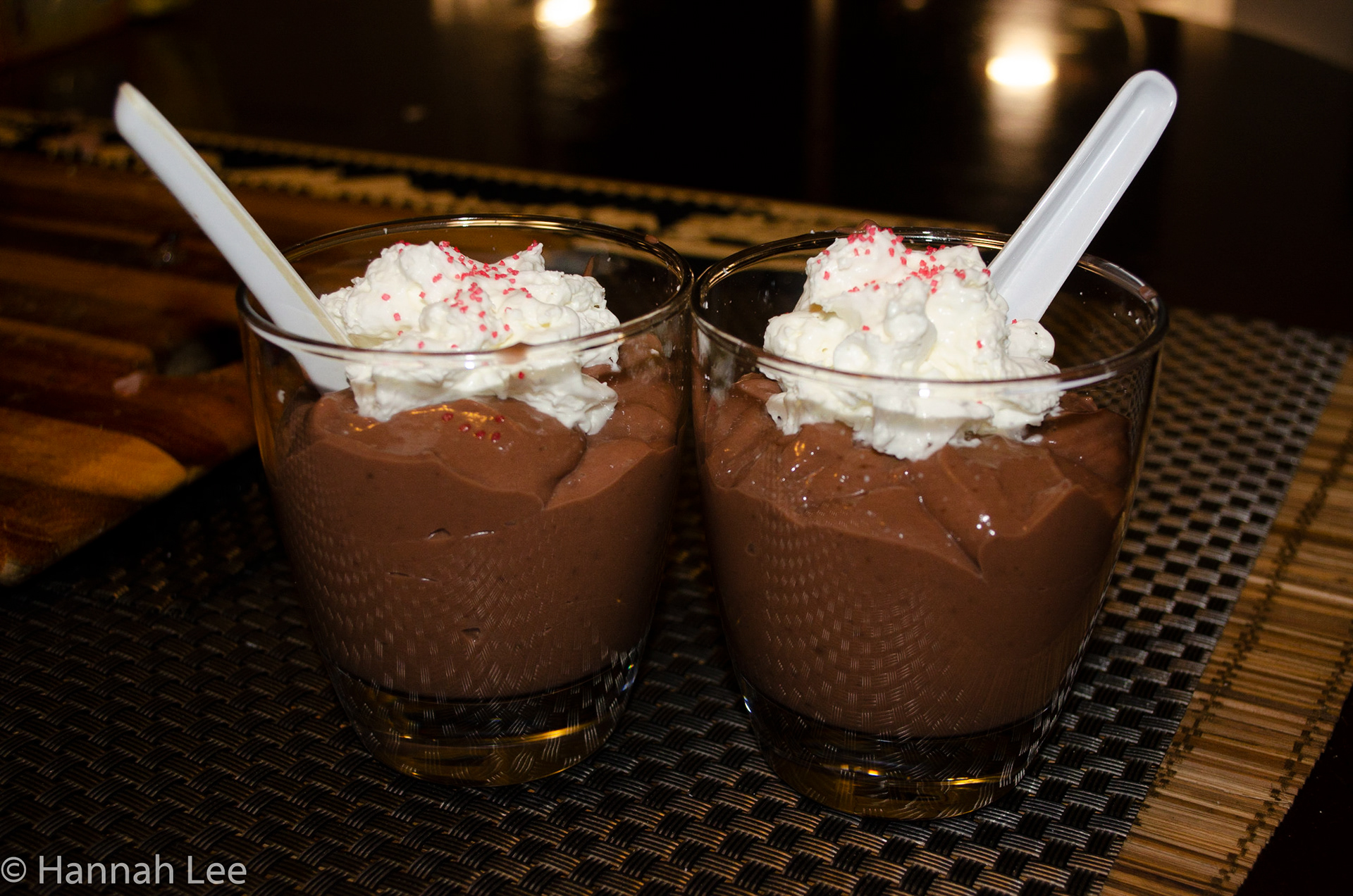 Godiva chocolate pudding with whipped cream on top and sprinkles for dessert made by Damian Boyd. Taken by Hannah Lee on Thanksgiving Day, November 26, 2020 in Somerville, MA. 1/60 second f 4.5 29 mm iso 250