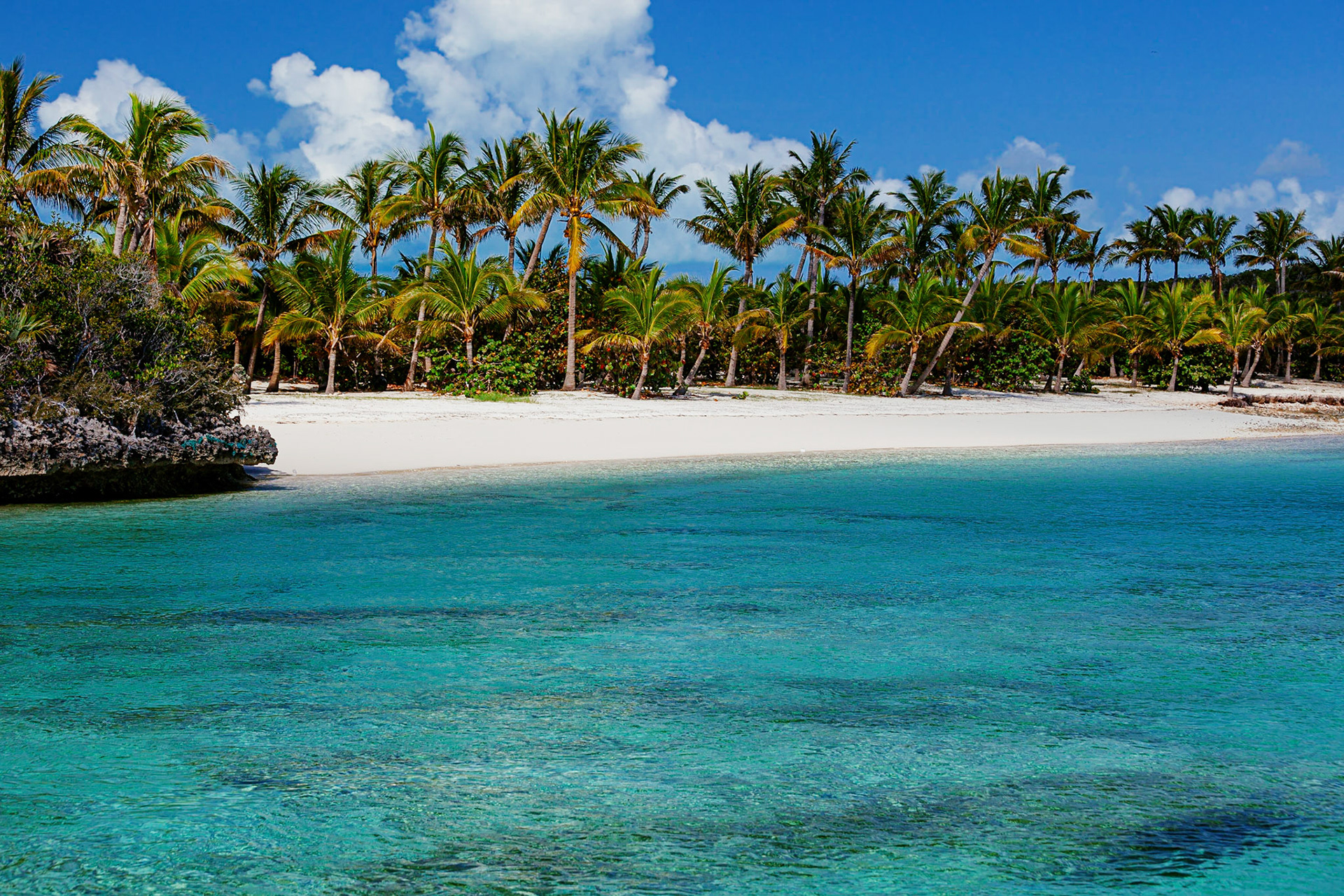Enjoy the perfect white sand tropical beach in the Exuma Land and Sea Park, Exuma Island, Bahamas.