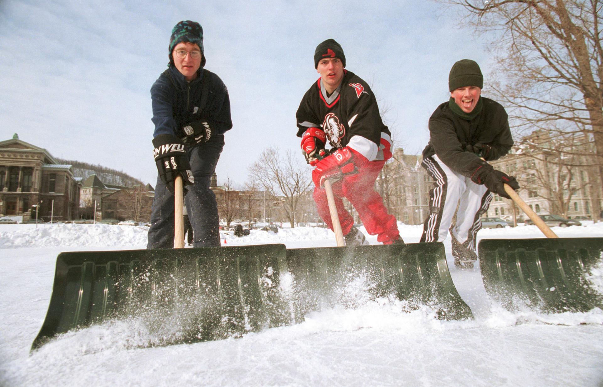Shovelling the lower-field rink, January 2000.