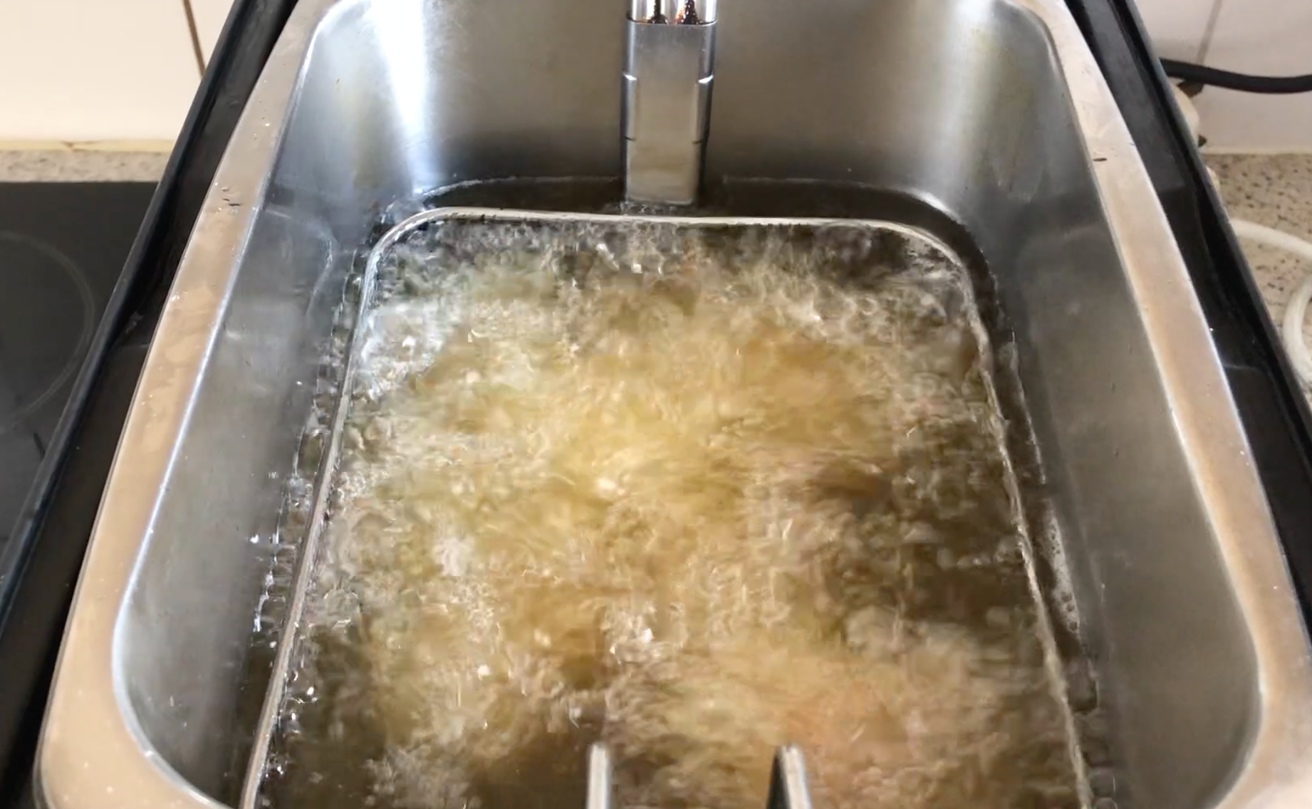 Frying Coated Chicken In A Deep Fryer