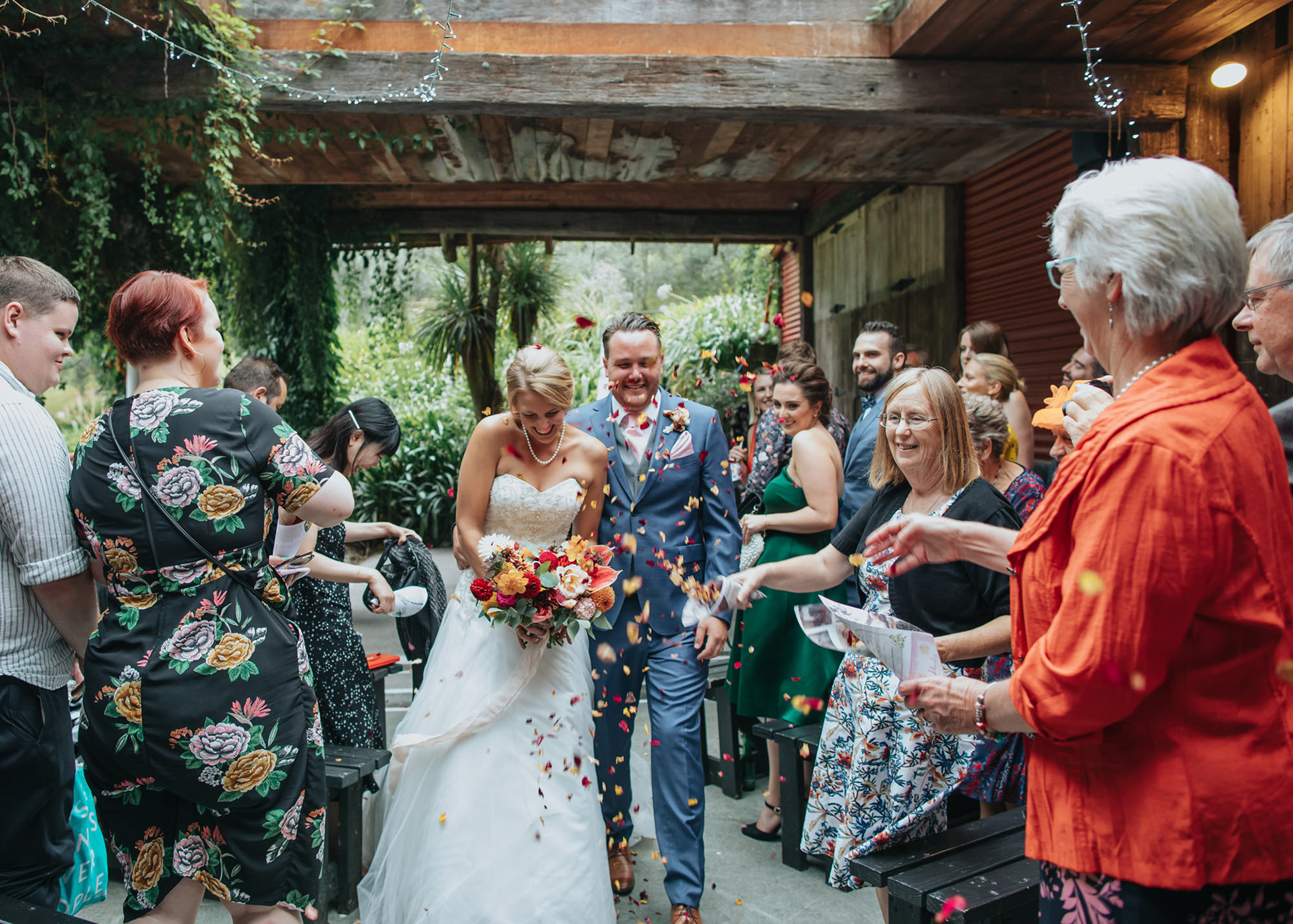 Sofia and Chris walking down the aisle after getting married at Sacred Hill Winery