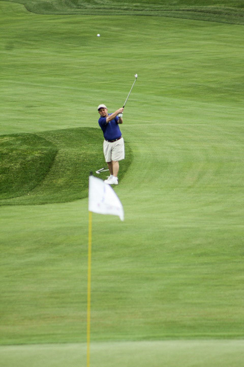 Chipping onto the green.