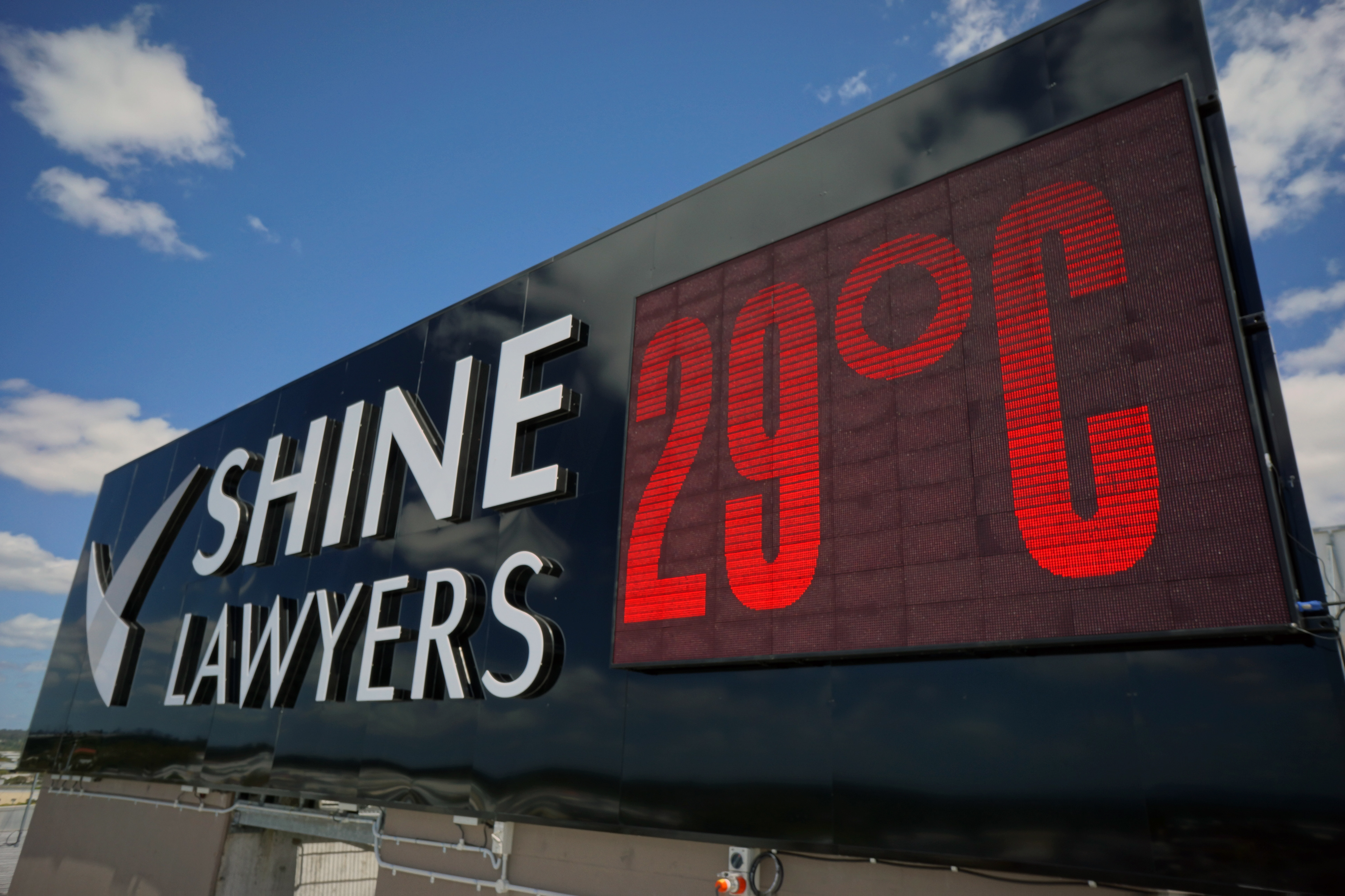 Shine Lawyers building signs - rooftop lightbox with led panels