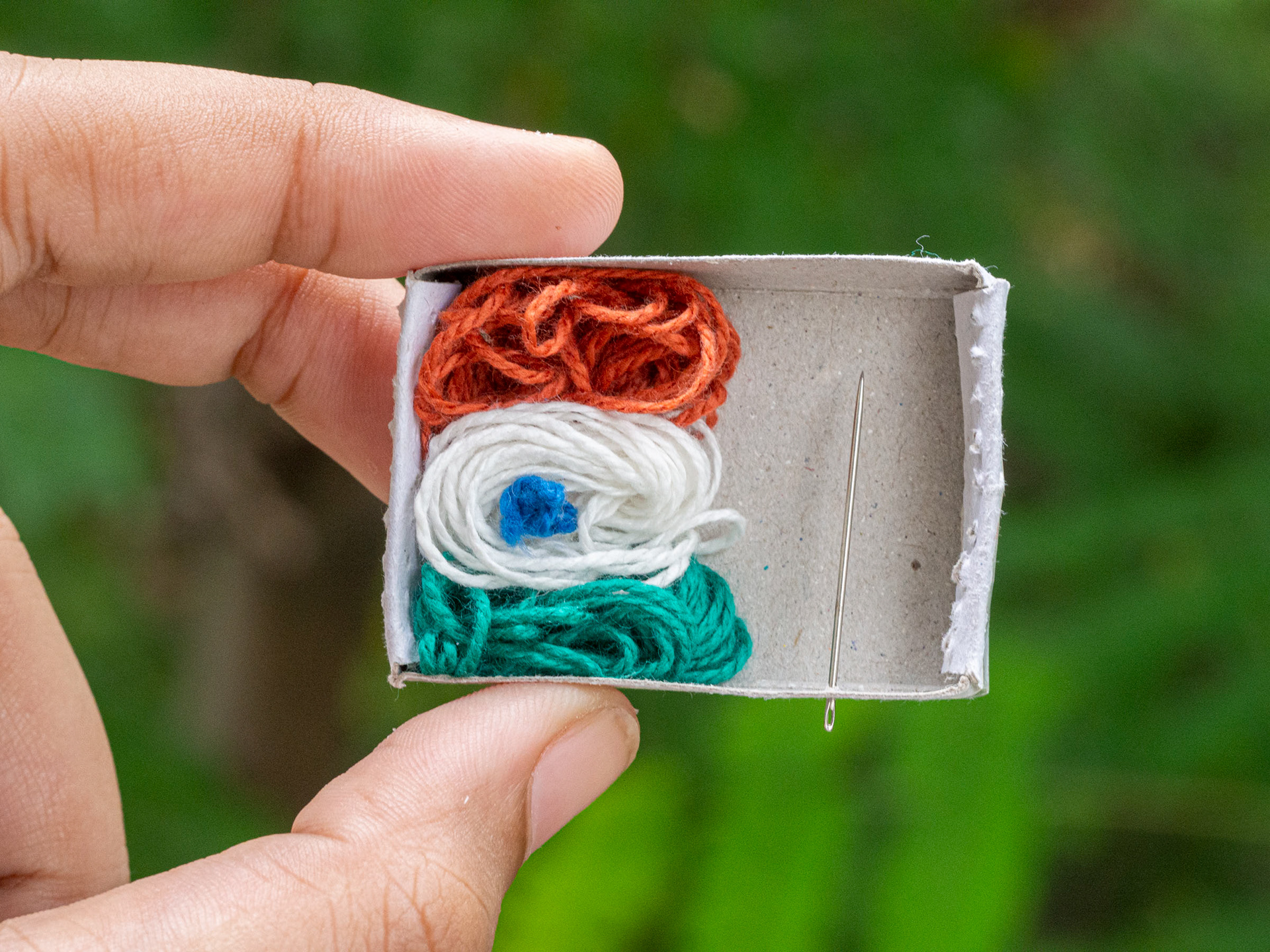 Weaving in my DIY mini loom.