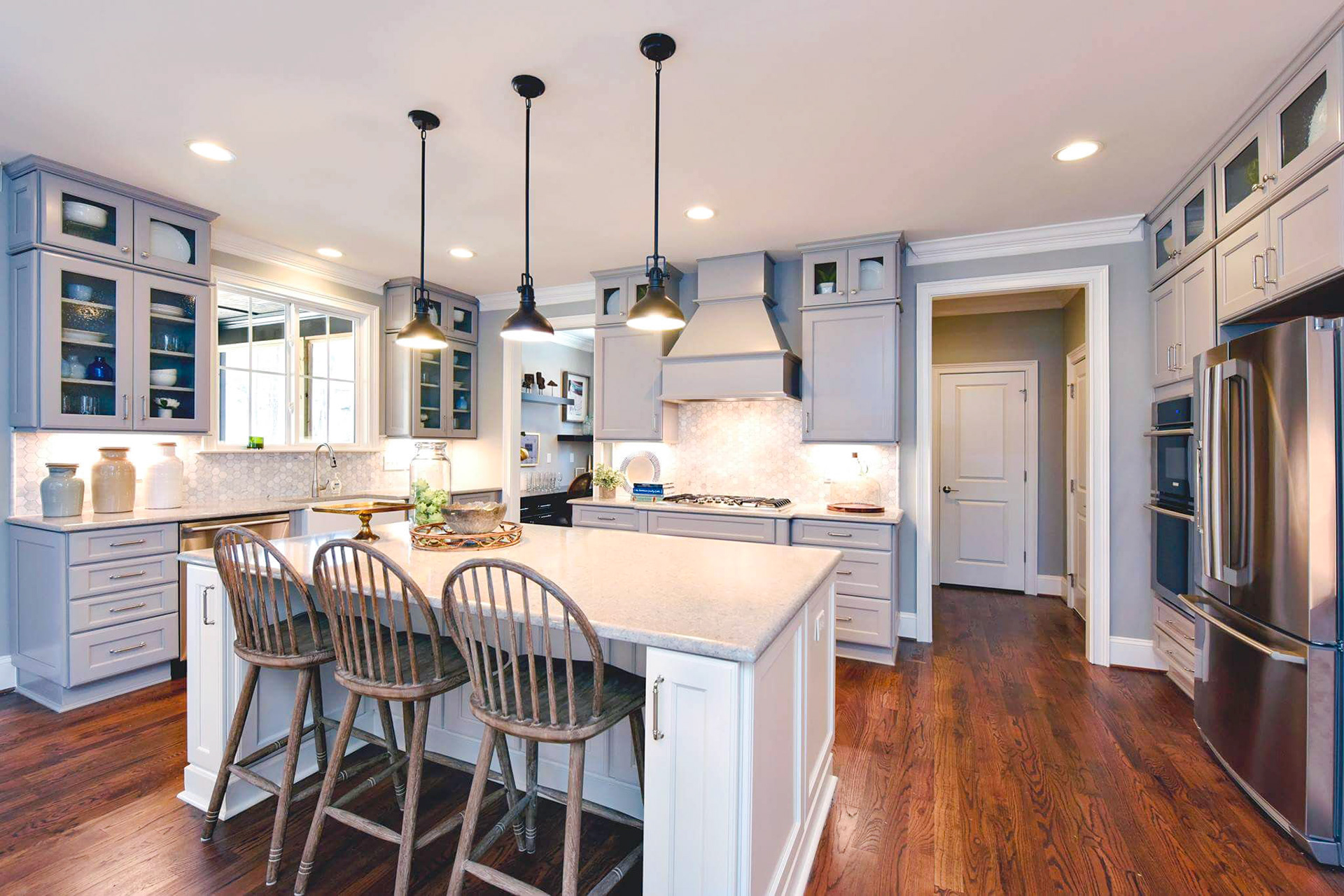 Personal Selections: Tile, flooring, and lighting. Other selections made by Merchandising Concepts. Photo Credit: Stanley Martin Homes.