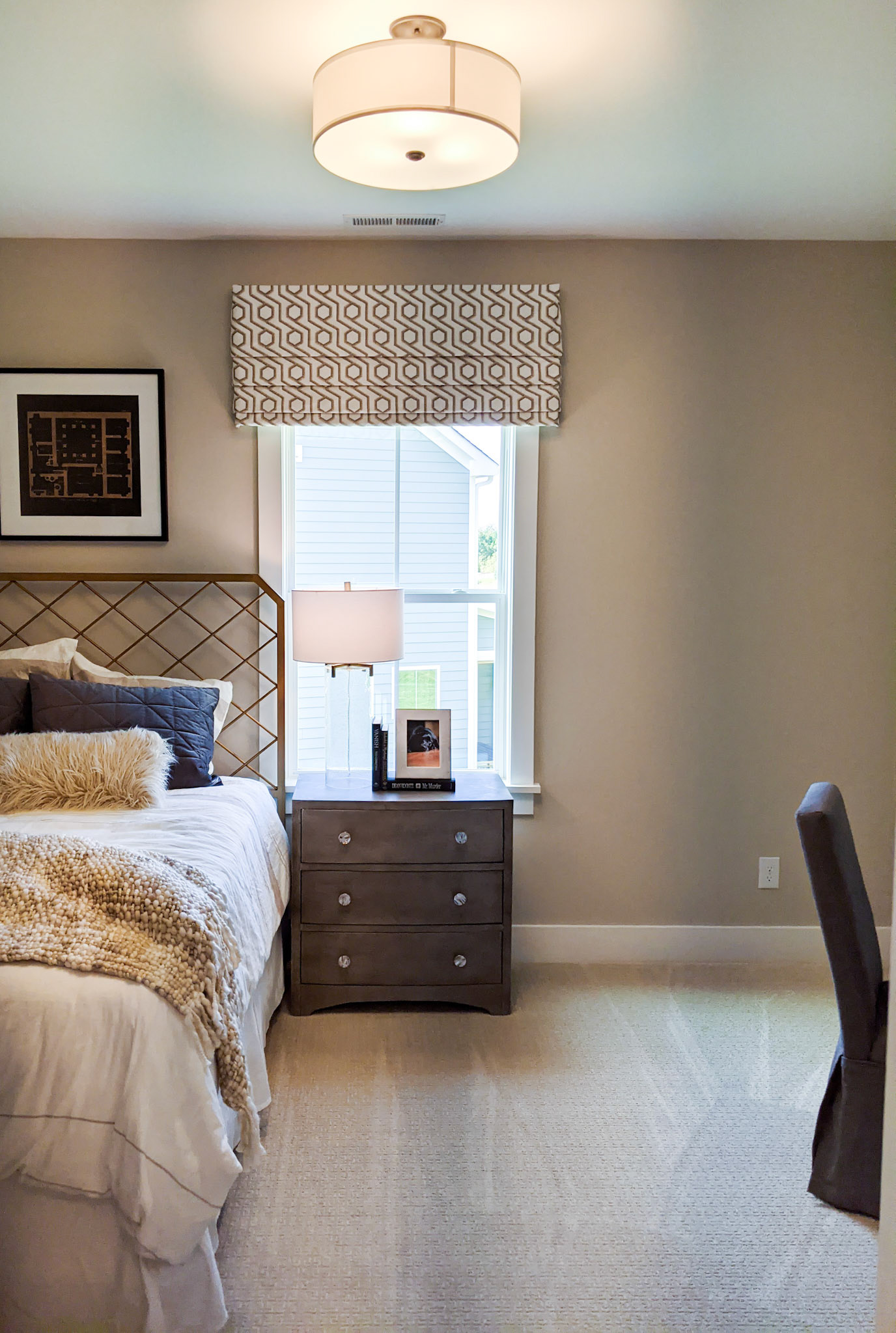 Personal Selections: Flooring & lighting. Other selections made by Model Home Interiors.