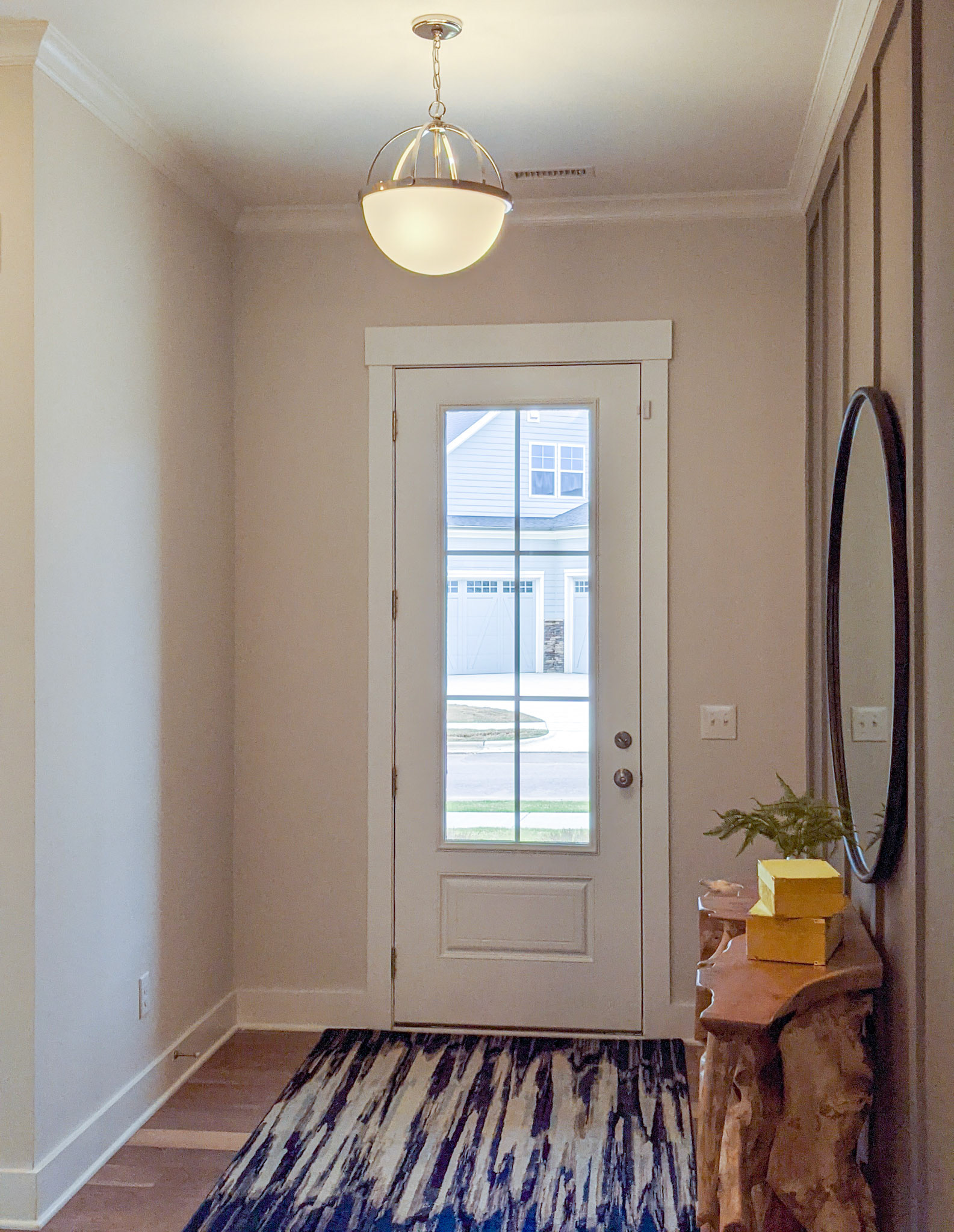Personal Selections: Flooring & lighting. Other selections made by Model Home Interiors.