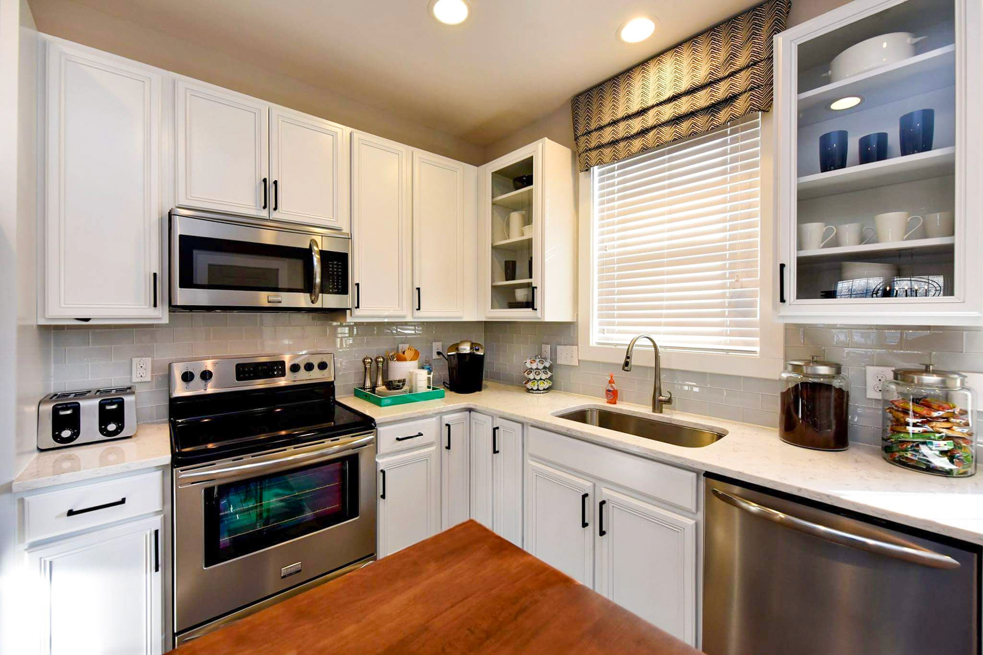 Personal Selections: Tile, flooring, and lighting. Other selections made by Model Home Interiors. Photo Credit: Stanley Martin Homes.