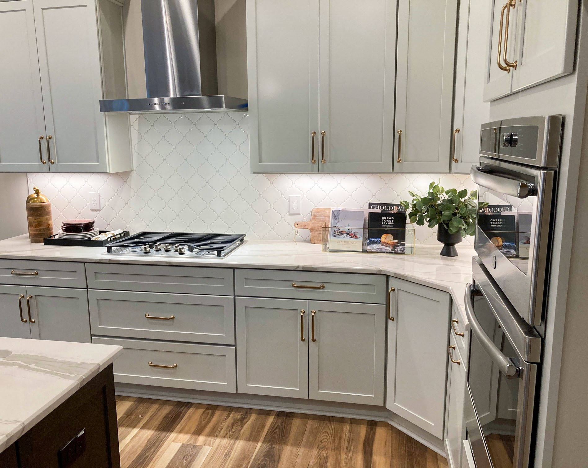 Personal Selections: Tile, flooring, and lighting. Other selections made by Model Home Interiors.