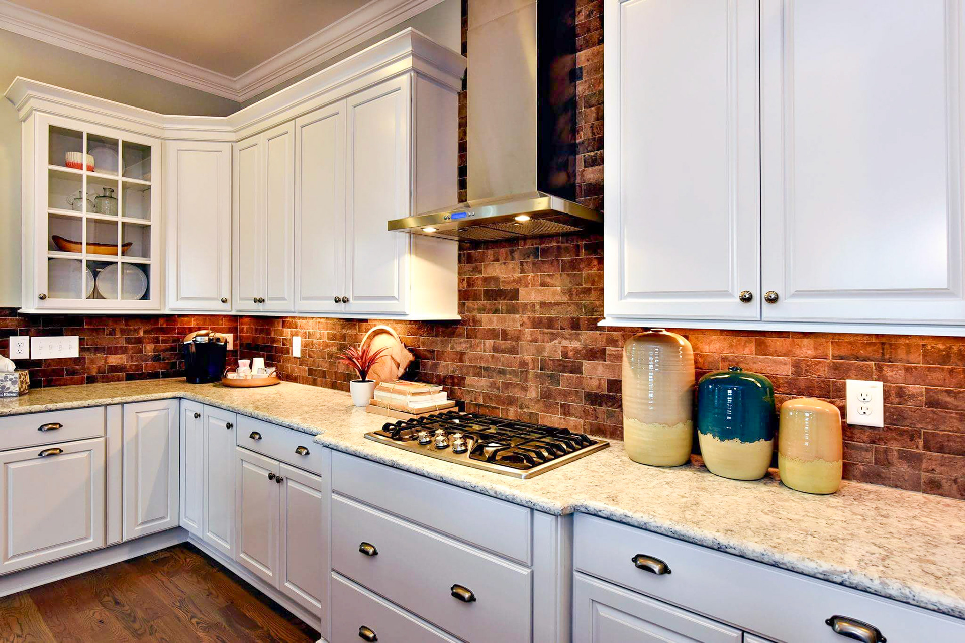 Personal Selections: Tile, flooring, and lighting. Other selections made by Merchandising Concepts. Photo Credit: Stanley Martin Homes.