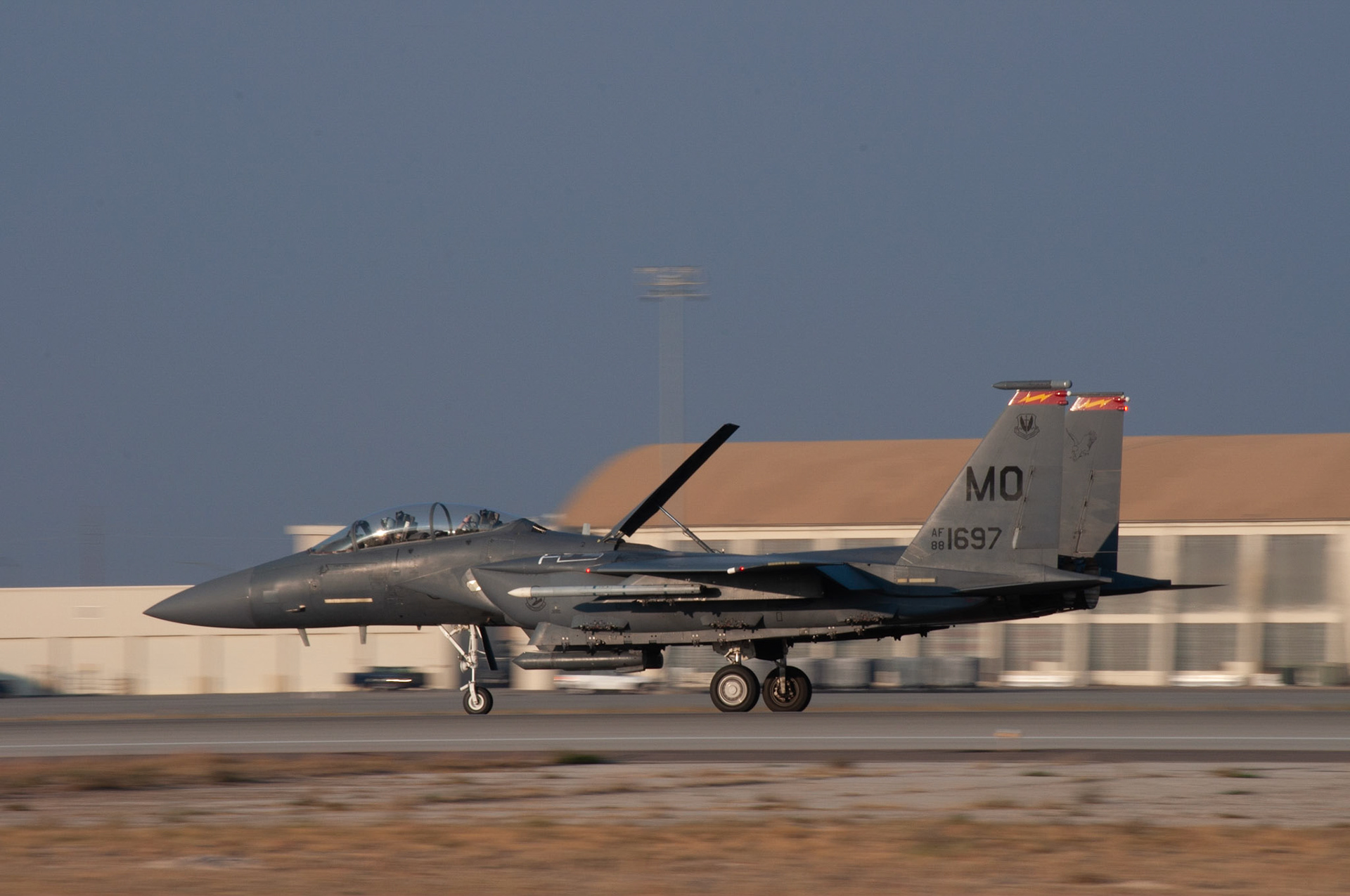 697 Panning 2: A/C 697, landing sequence, 20201002 @ 1820 evening sun, Mountain Home AFB, Miller, I wanted to find a subject that I could capture in high speed during different times of the day and play with the light source. The evening sun was perfect while I was capturing these landing shots. This was just after the aircraft past me, but I was still able to stay on it and capture the movement. Camera Settings: Nikon D500, ISO 200, 180mm, f/22, 1/80s