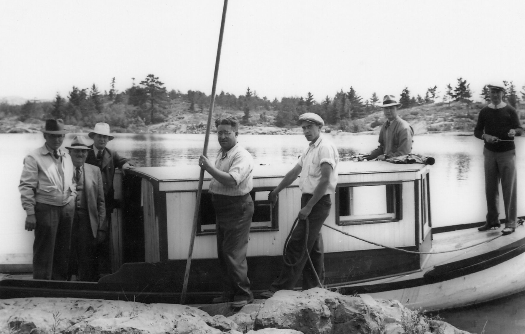 Ernie Spry's 'Kayak' (Ernie Spry with pole) circa 1947 Timkin's Bay - John & Sissy Nichols