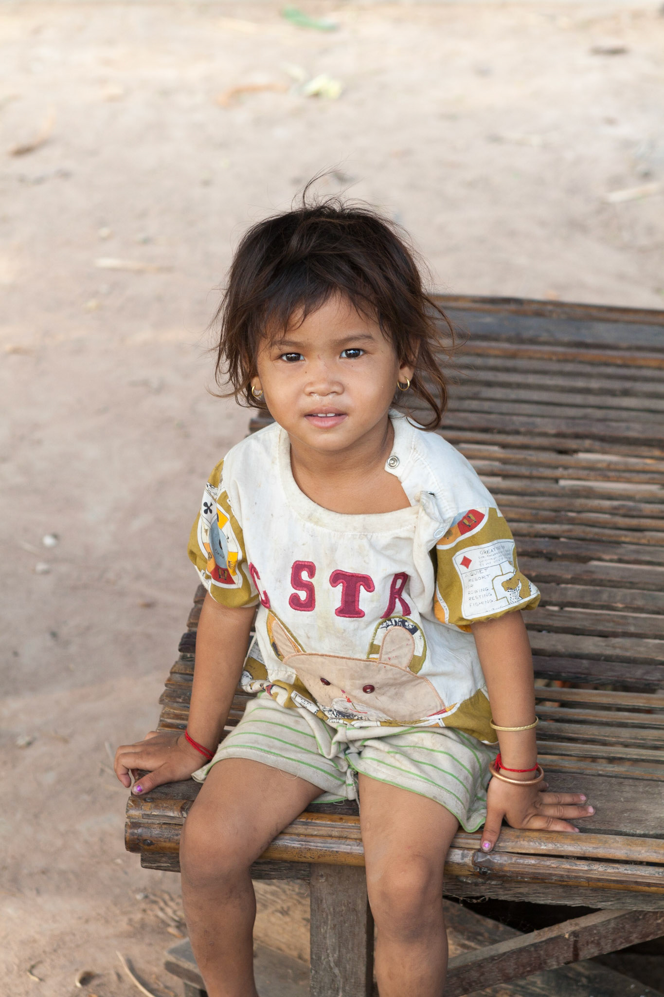 Young Cambodian Child on the street to Tonle Sap