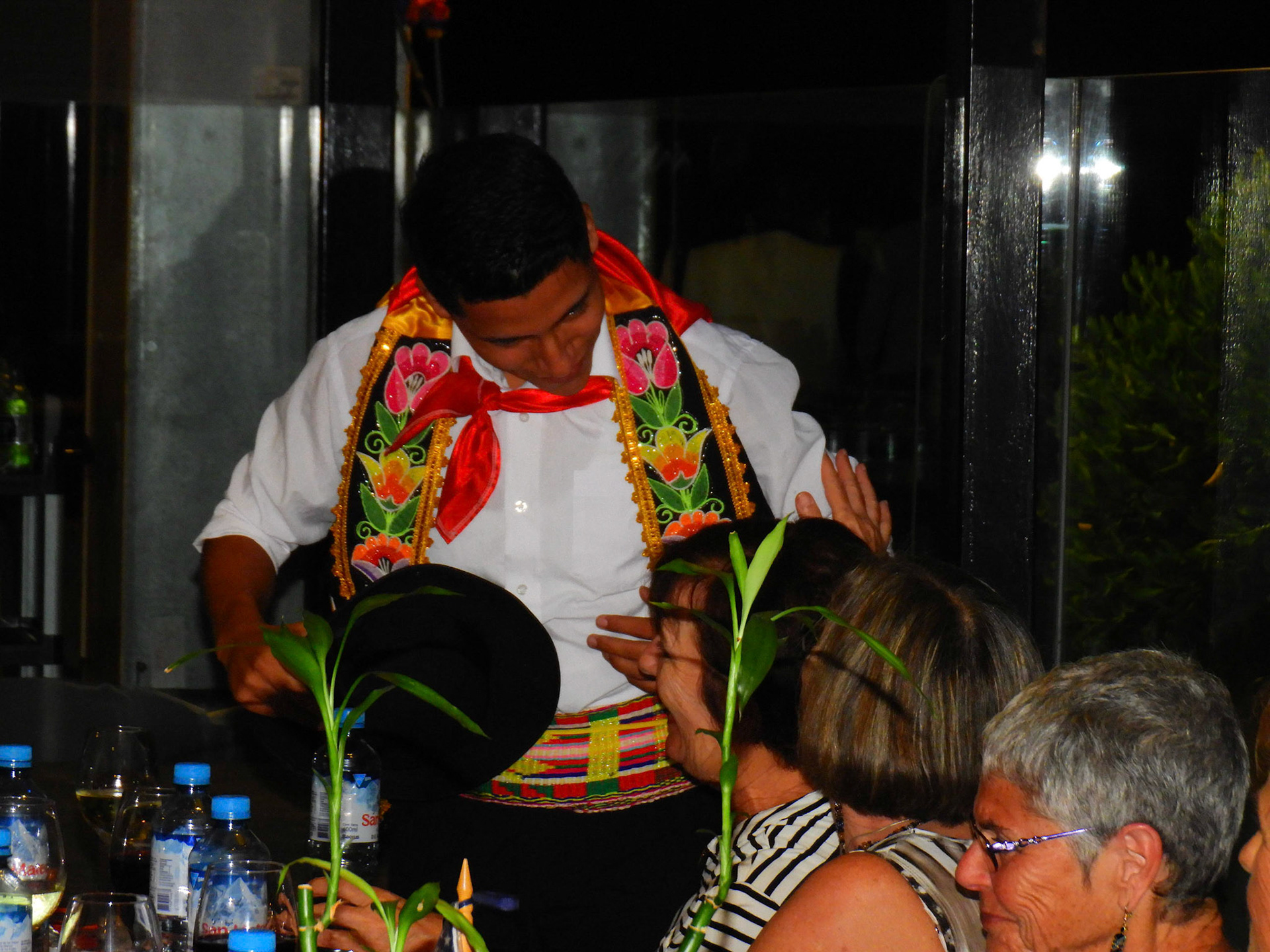 Dinner and folk dances at a restaurant on the beach