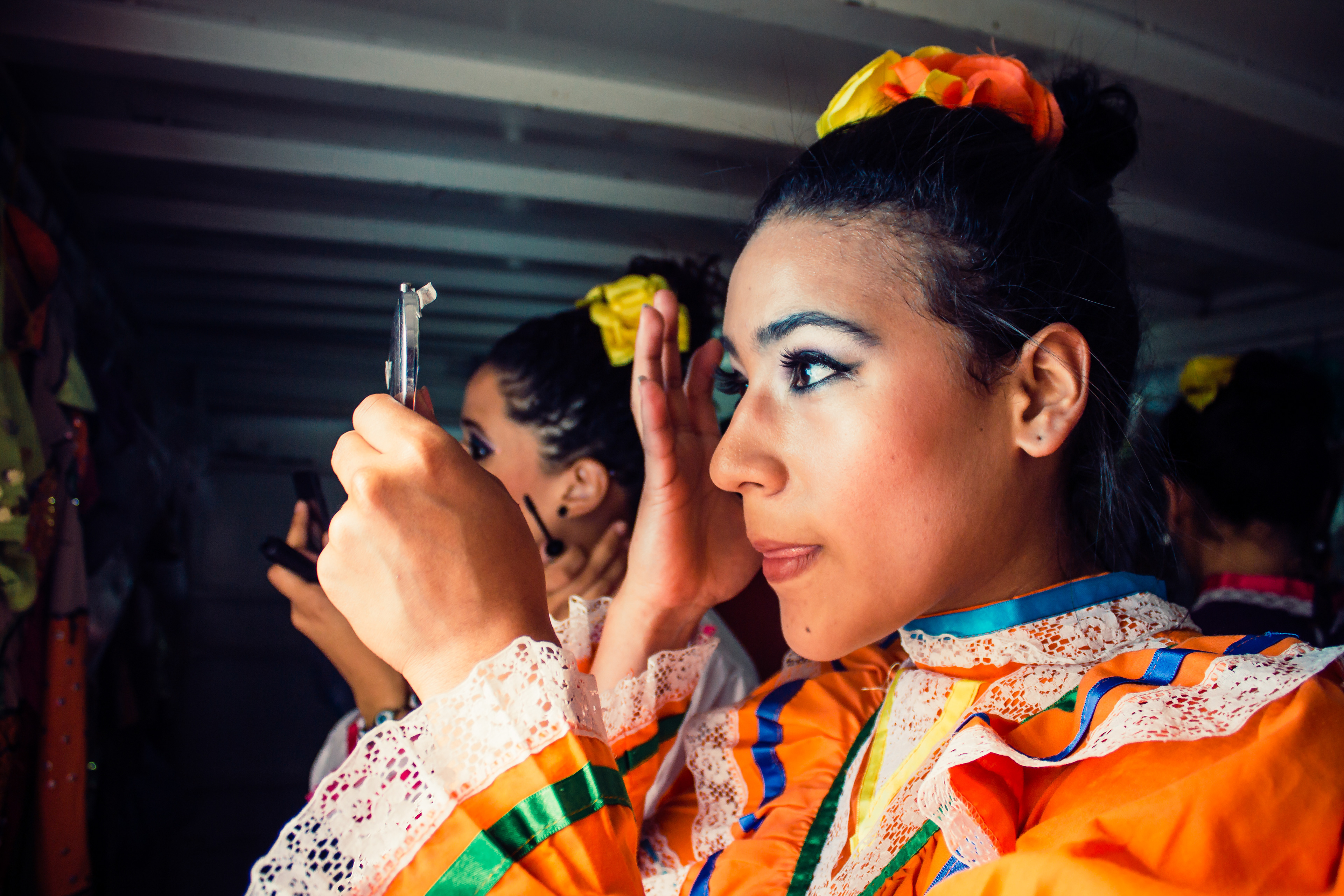 The girls from the dancing crew changing outfits for their next performance. Caracas 2015