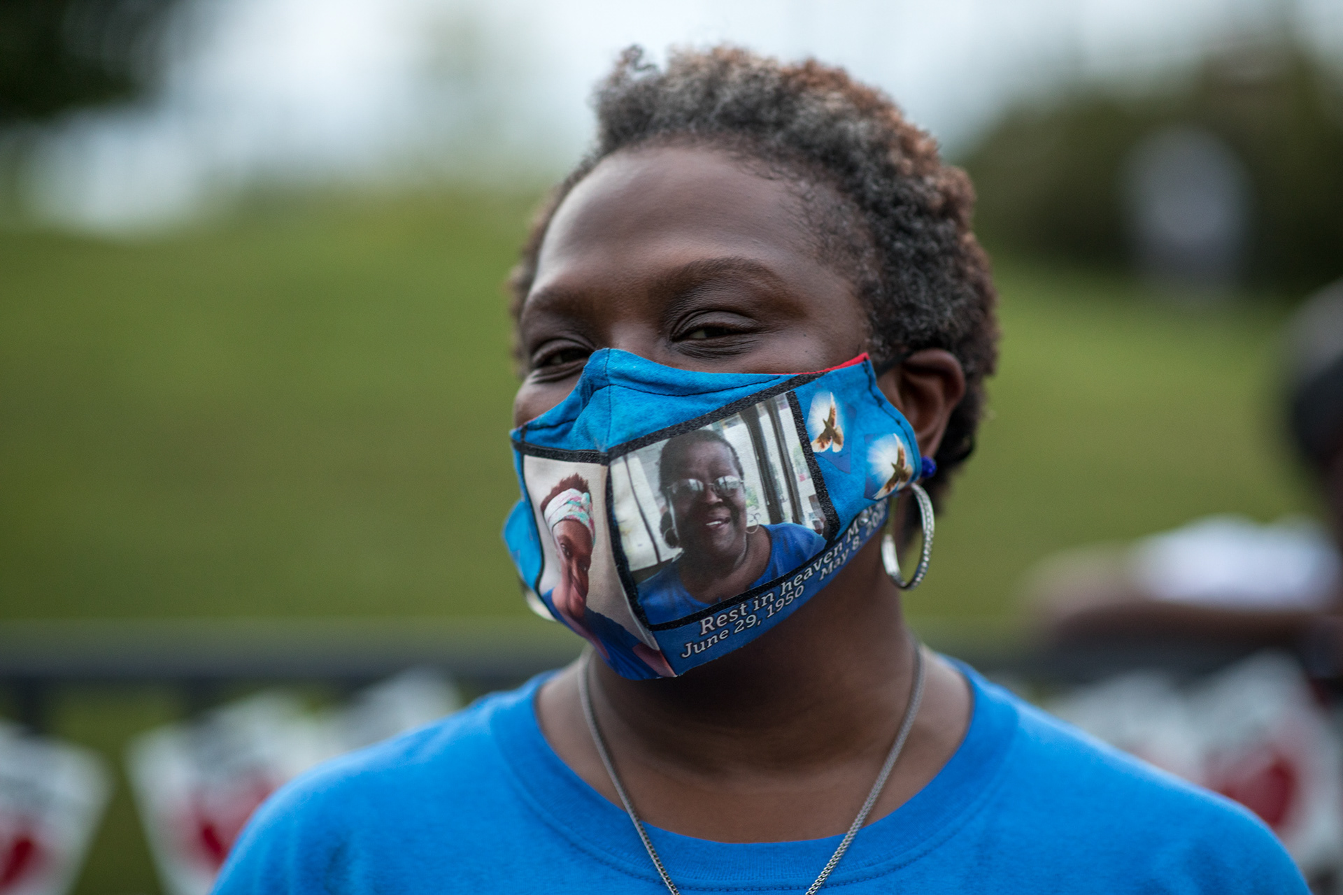 Yolanda Melson wears a mask honoring her mother, Carolyn Russell, who died from COVID-19 May 8.