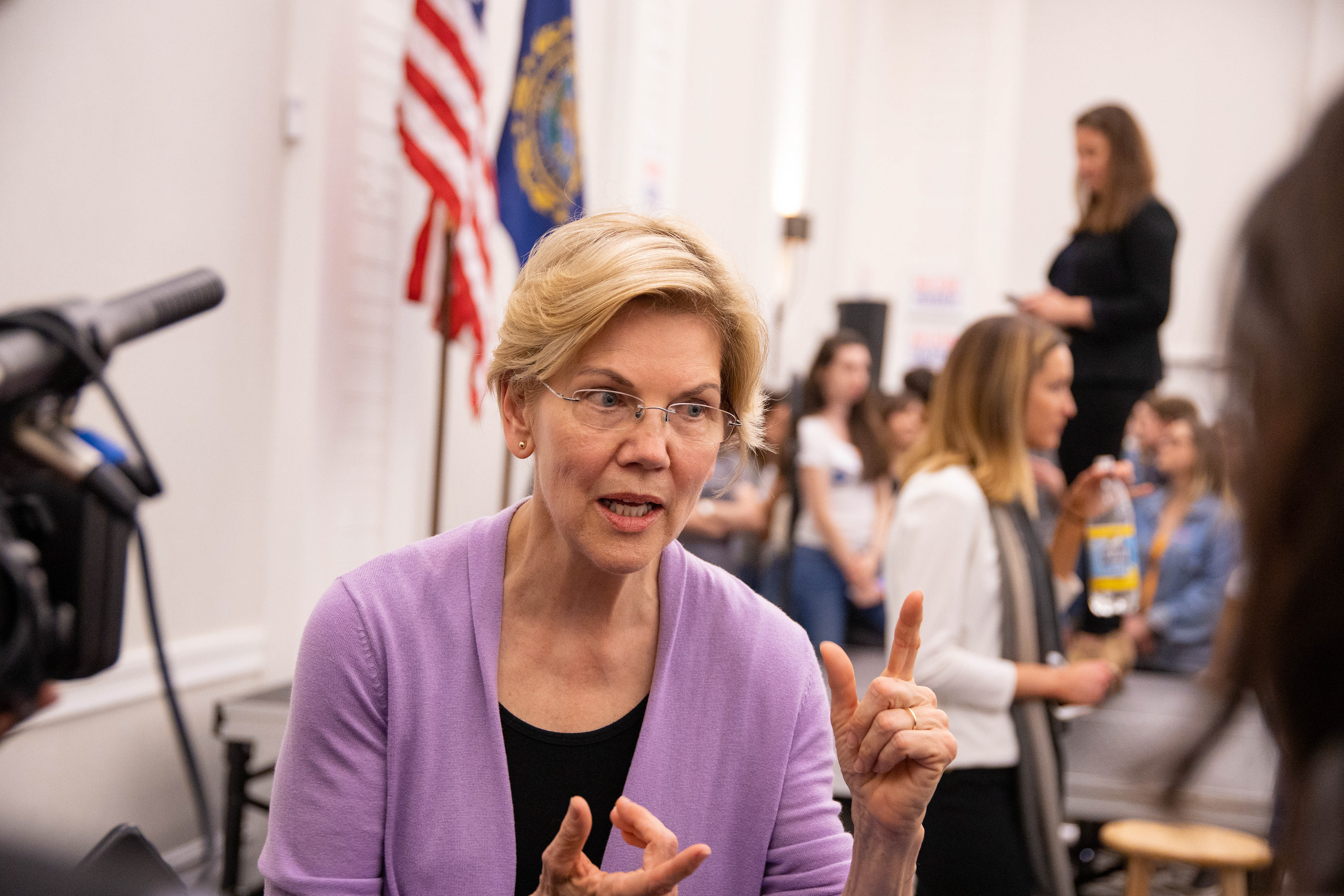 Sen. Warren addresses reporters after the town hall