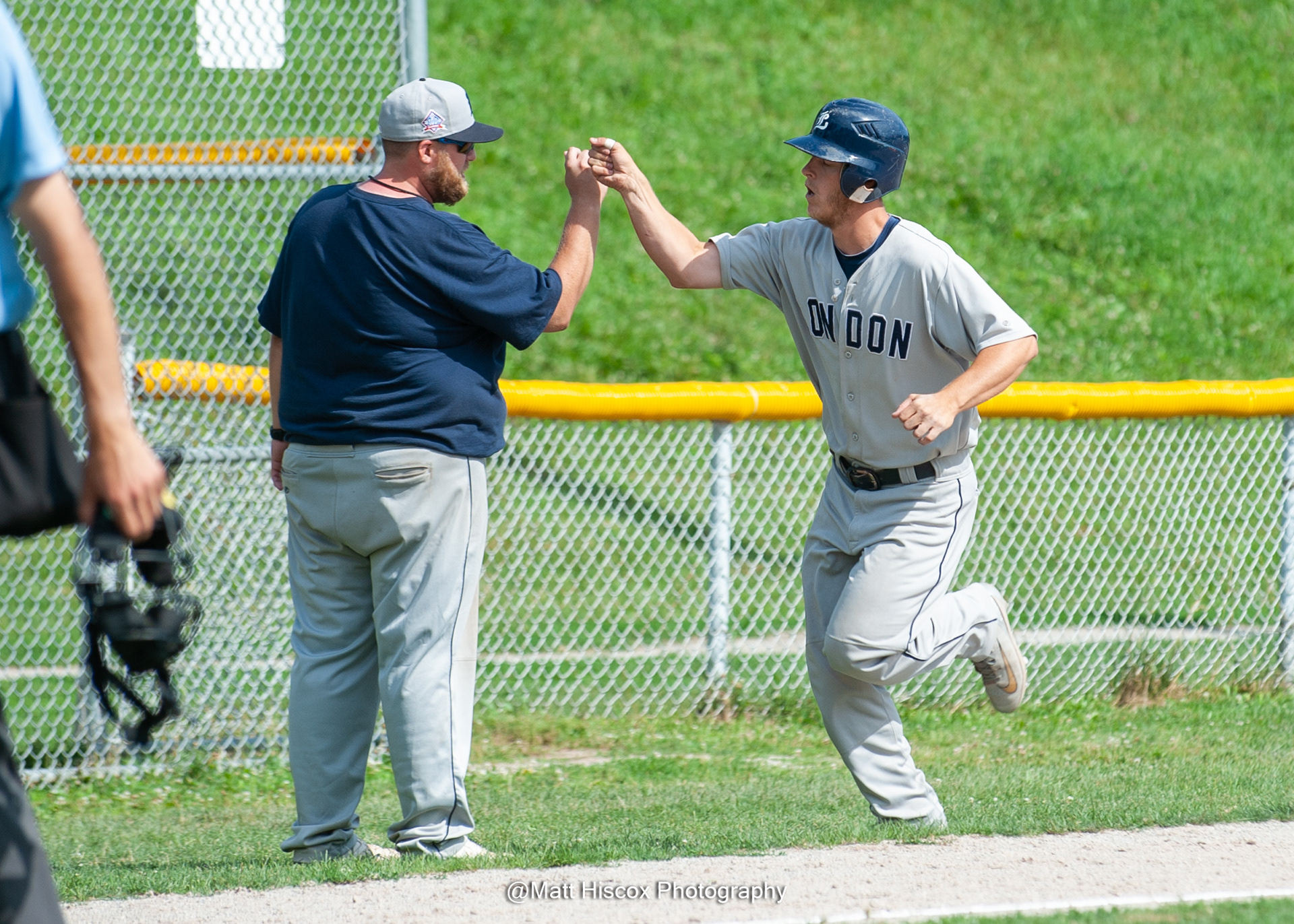 Brent Wales fist bumps Mike Ambrose