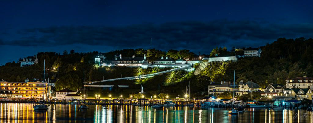 Mackinac Island at night with incredible view and reflection on the water