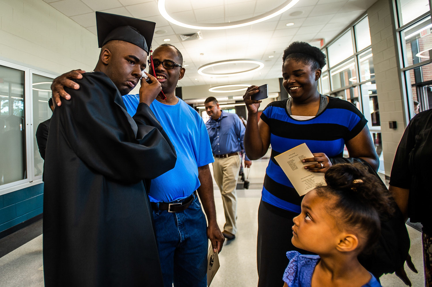 Family greets an emotional Anthony Jacquez Robinson after he graduated Decatur High School on May 16, 2019, in Decatur, Ala. He talks softly, but is a leader and the big man on campus, said lead administrator Mary Hillis at Decatur High Developmental. Robinson, who is classified as developmentally delayed, is leaving Decatur High Developmental, but not to be confined to a life at home. Hes one of the first students selected to participate in the Project SEARCH program at Decatur Morgan Hospital. The program, which started in 1996 at Cincinnati Childrens Hospital Medical Center, secures employment for people with disabilities.
