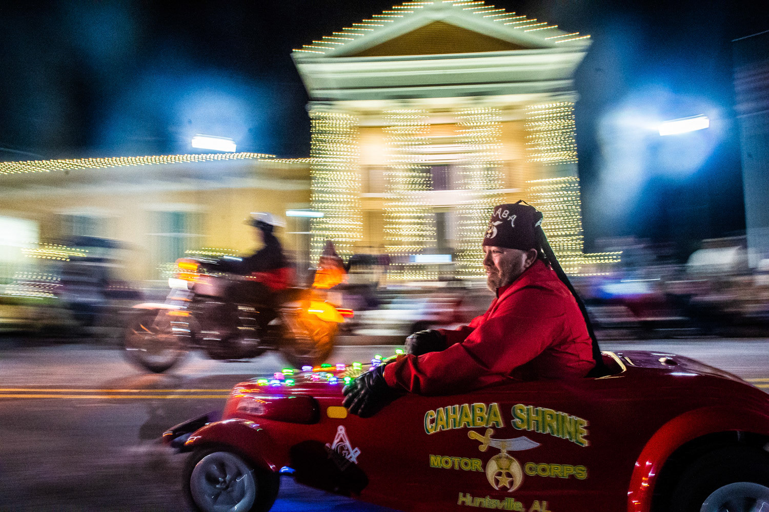 The Cahaba Shriner Motor Corps makes their way down Hobbs Street on Thursday during the Athens Christmas Parade in downtown Athens. [DAN BUSEY/DECATUR DAILY]
